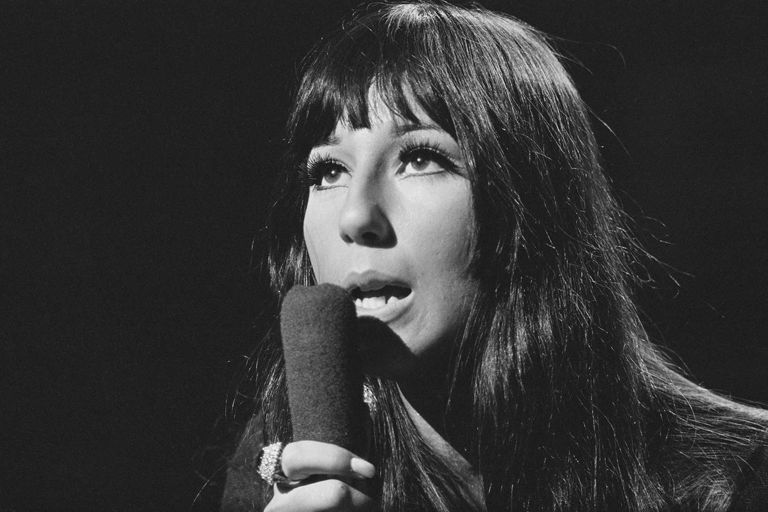 Cher of the pop duo Sonny & Cher in action during a performance of the single 'Little Man' on the set of the Associated Rediffusion Television pop music television show Ready Steady Go