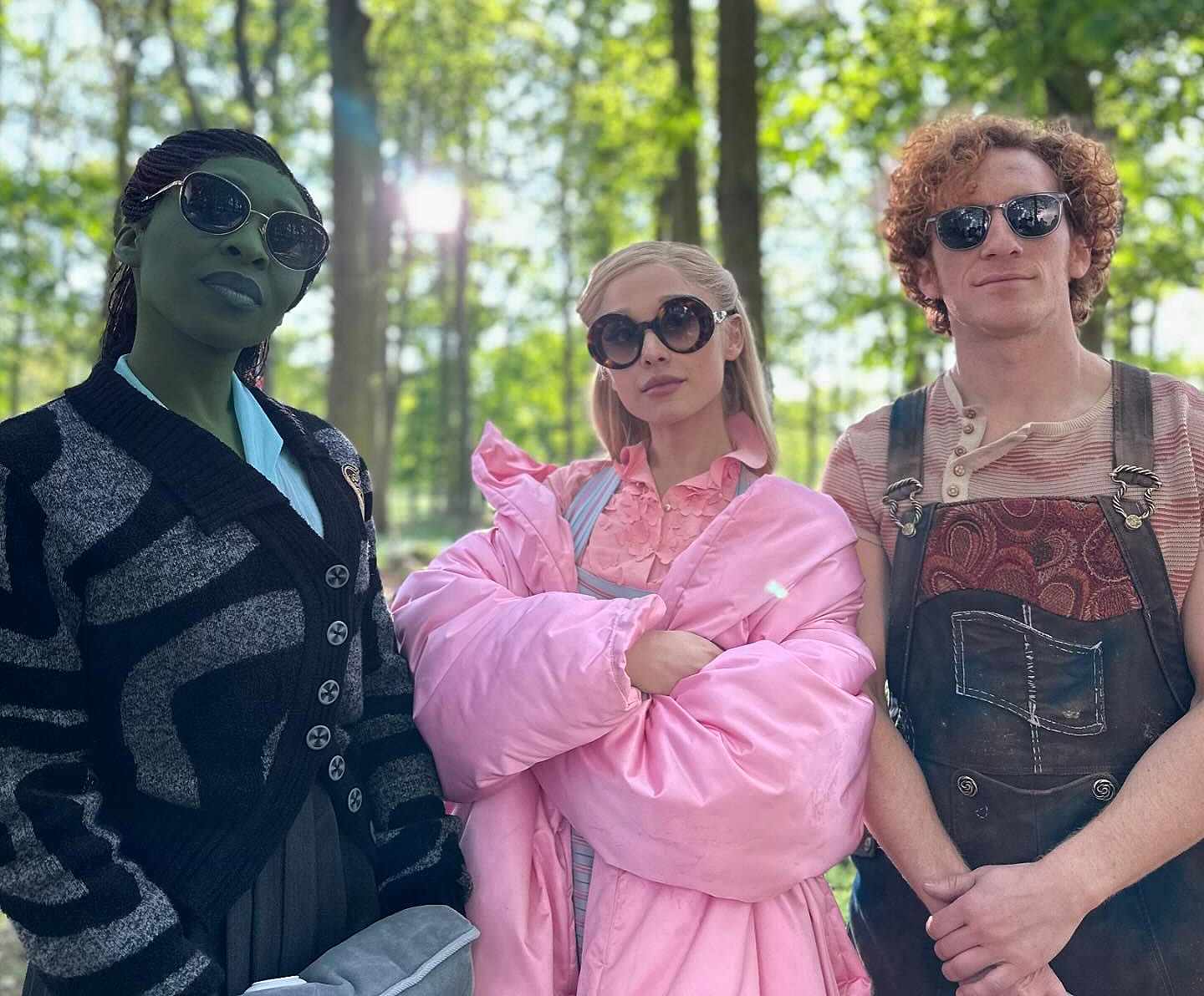 Cynthia Erivo, Ariana Grande and Ethan Slater behind the scenes of Wicked