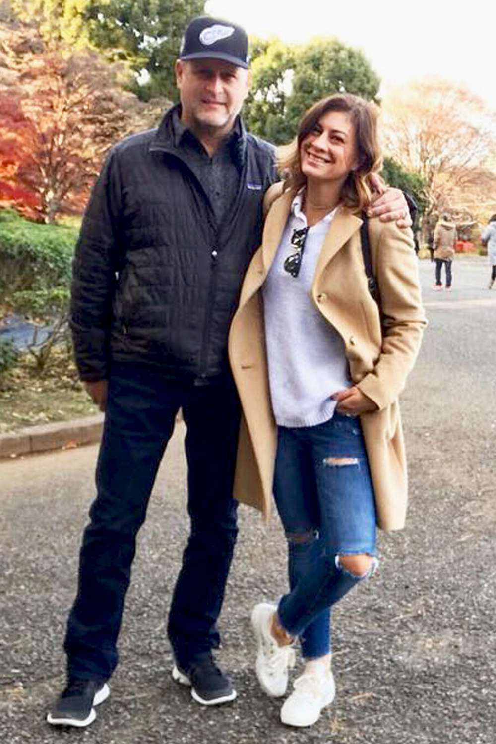 Dave Coulier and Melissa Bring Coulier enjoy a walk together in December 2016.