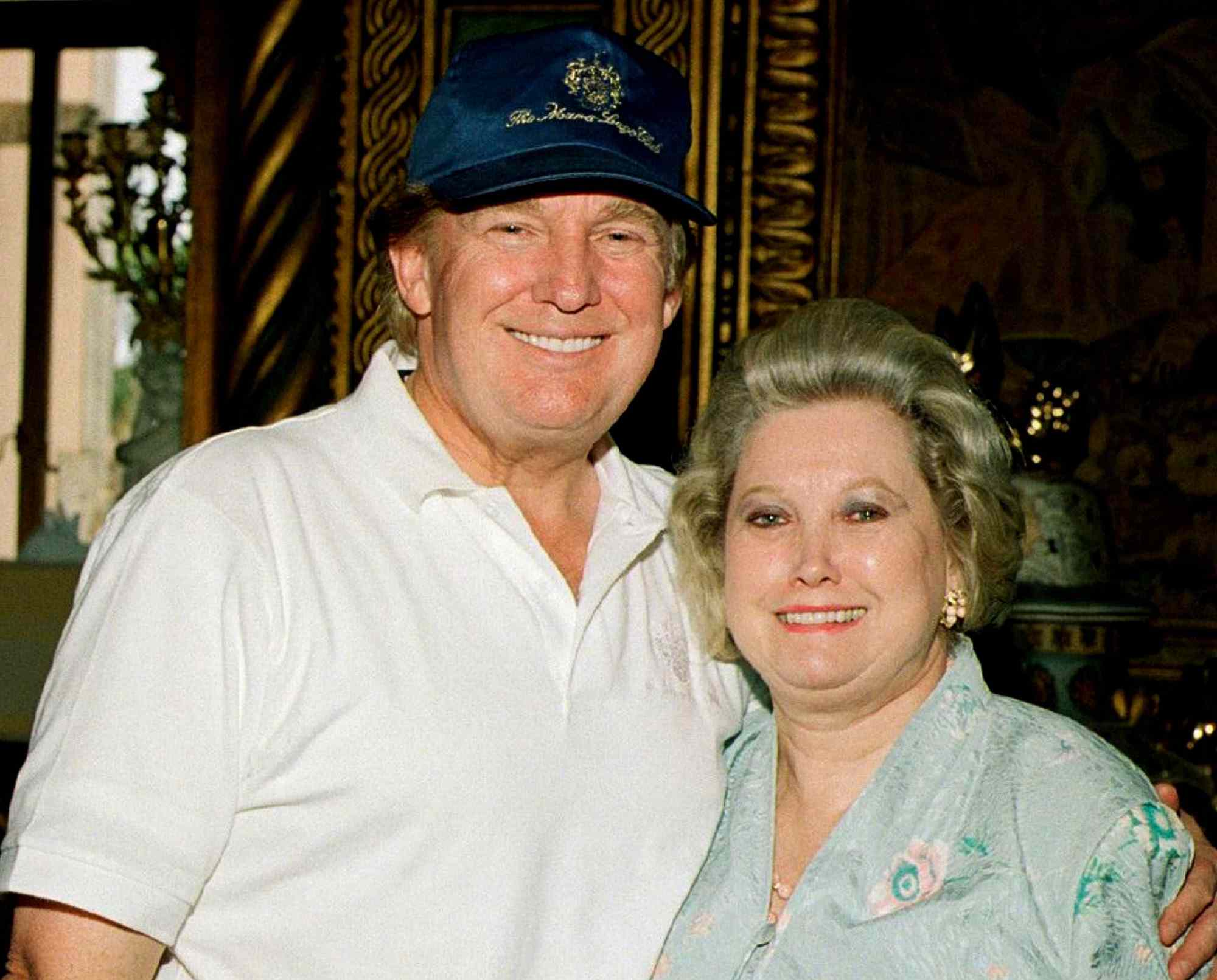 Donald Trump smiles and banker Elizabeth Trump Grau