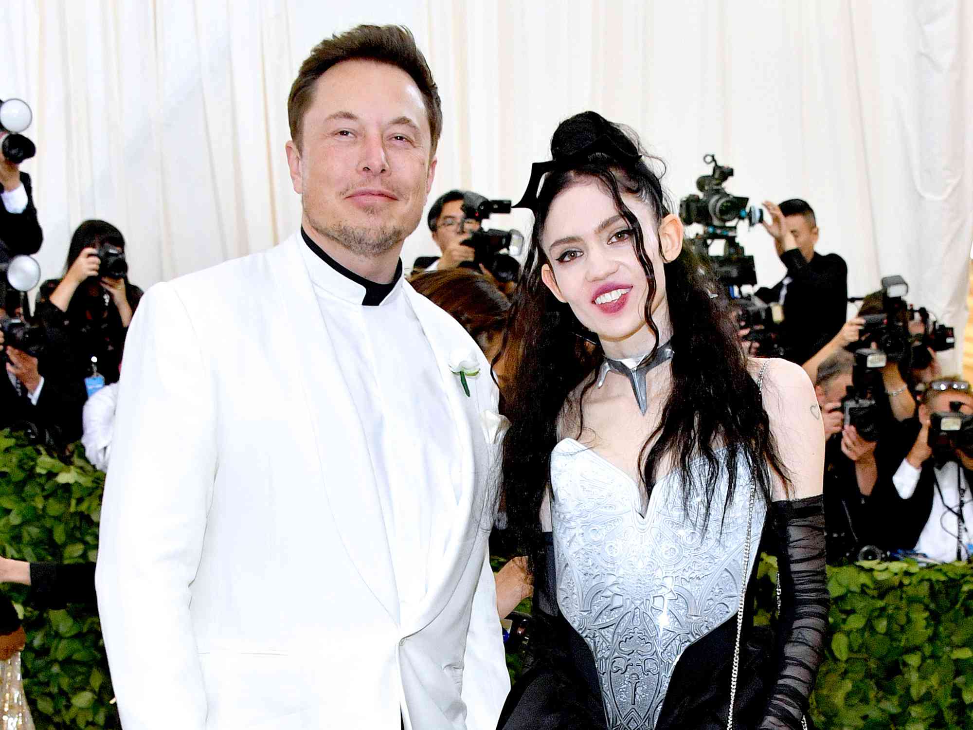 Elon Musk and Grimes attend the Heavenly Bodies: Fashion & The Catholic Imagination Costume Institute Gala at The Metropolitan Museum of Art on May 7, 2018 in New York City