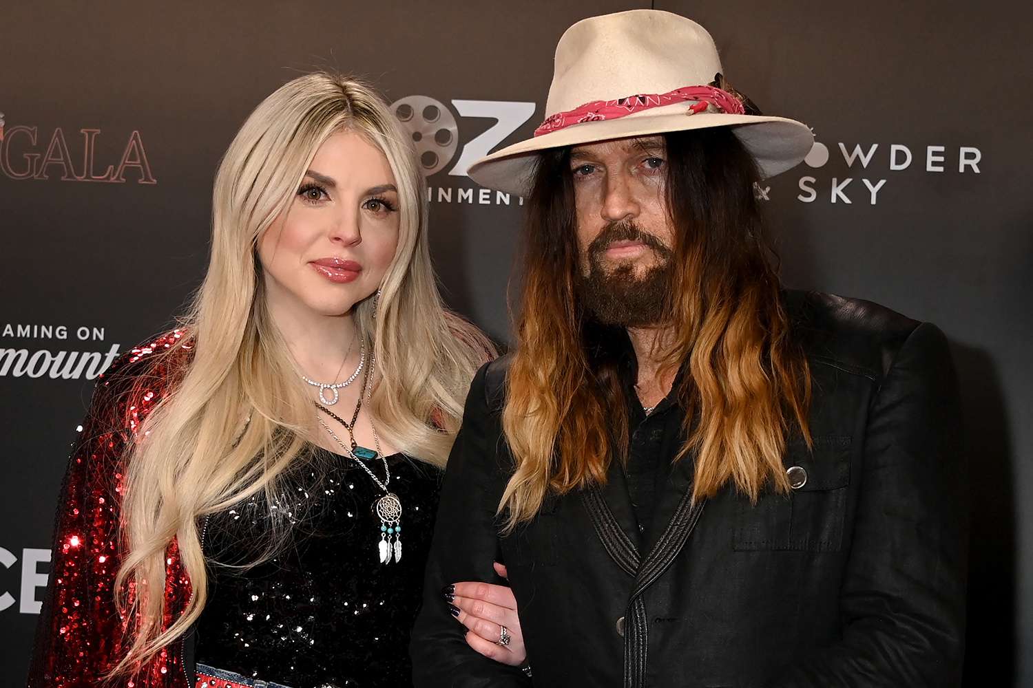 Firerose and Billy Ray Cyrus arriving at "Dolly Parton's Pet Gala", a two-hour variety show special airing on Wednesday, February 21 