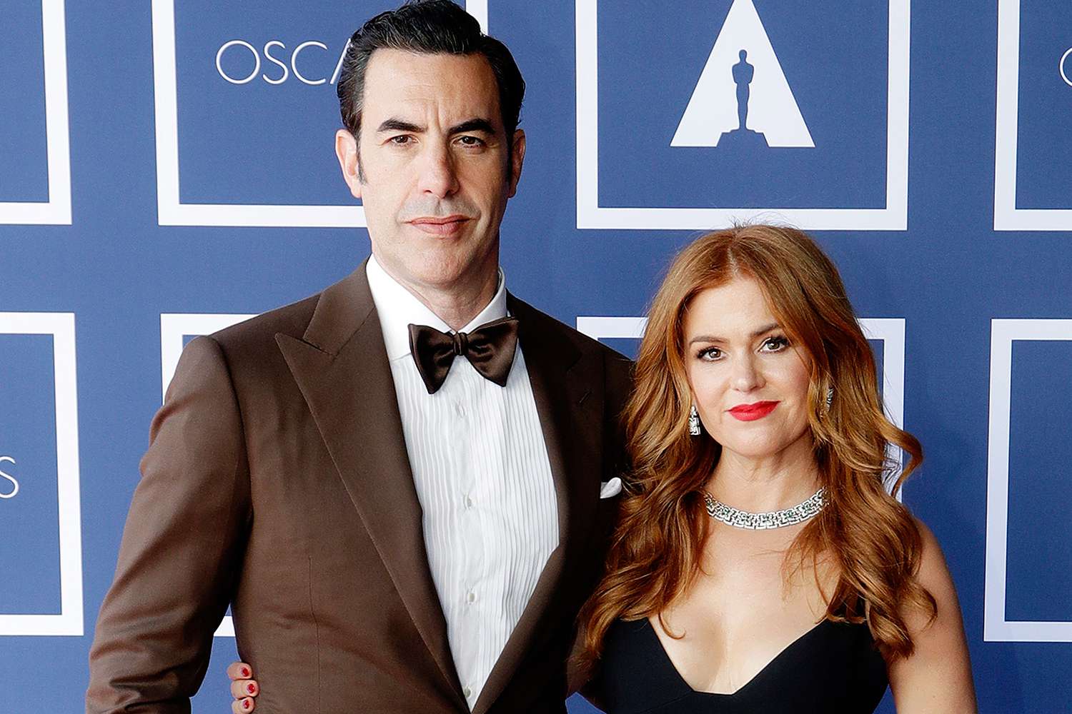 Sacha Baron Cohen (L) and Isla Fisher attend a screening of the Oscars on Monday, April 26, 2021 in Sydney, Australia. 