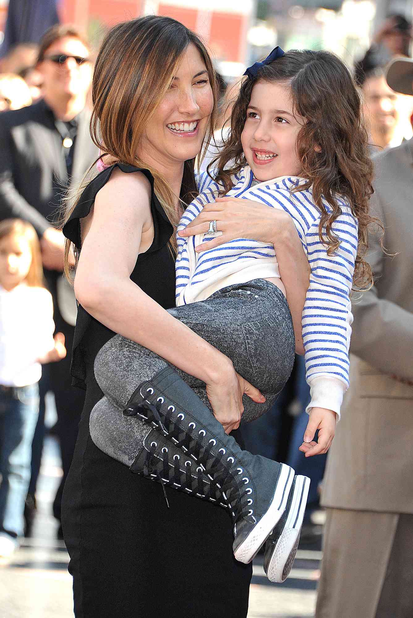 Adam Sandler's wife and daughter attend the ceremony honoring him with the 2,431st Star on The Hollywood Walk of Fame