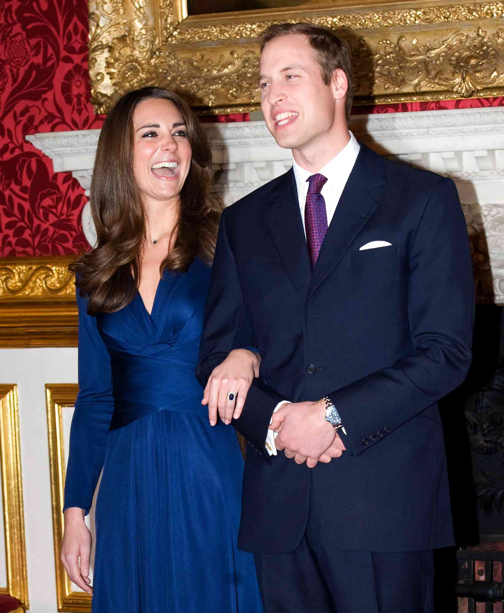 Prince William and Kate Middleton pose for photographs in the State Apartments of St James Palace on November 16, 2010 in London, England. After much speculation, Clarence House today announced the engagement of Prince William to Kate Middleton. The couple will get married in either the Spring or Summer of next year and continue to live in North Wales while Prince William works as an air sea rescue pilot for the RAF. The couple became engaged during a recent holiday in Kenya having been together for eight years.