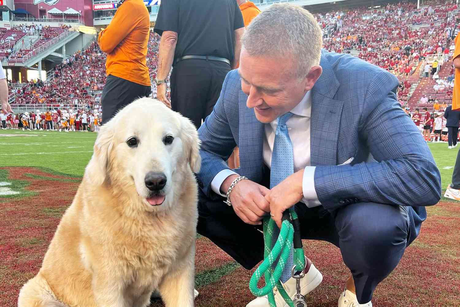 Kirk Herbstreit with his dog Ben before a college football game between the Arkansas Razorbacks and Tennessee Volunteers on October 5, 2024.