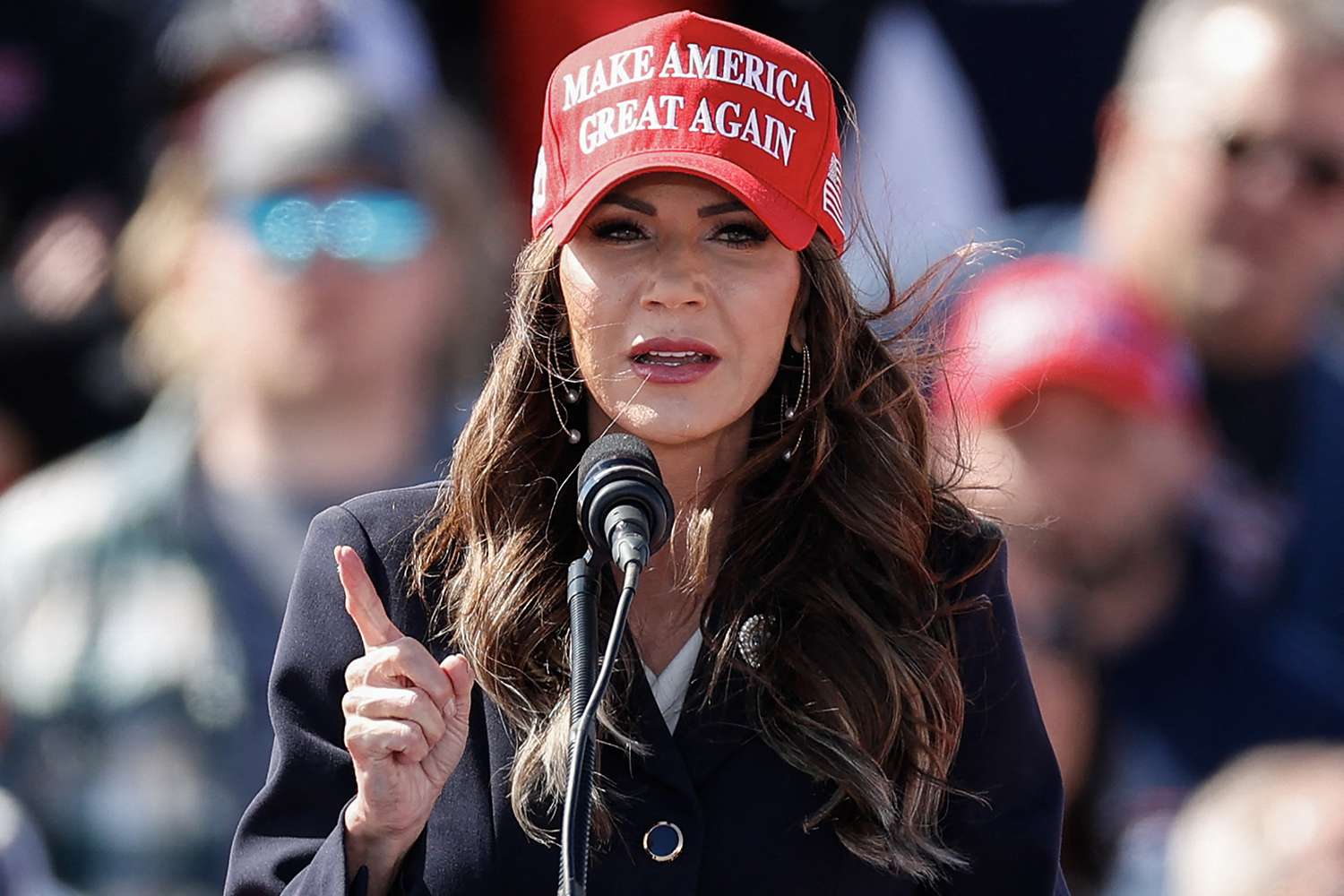 South Dakota Governor Kristi Noem speaks before former US President and Republican presidential candidate Donald Trump takes the stage during a Buckeye Values PAC Rally in Vandalia, Ohio