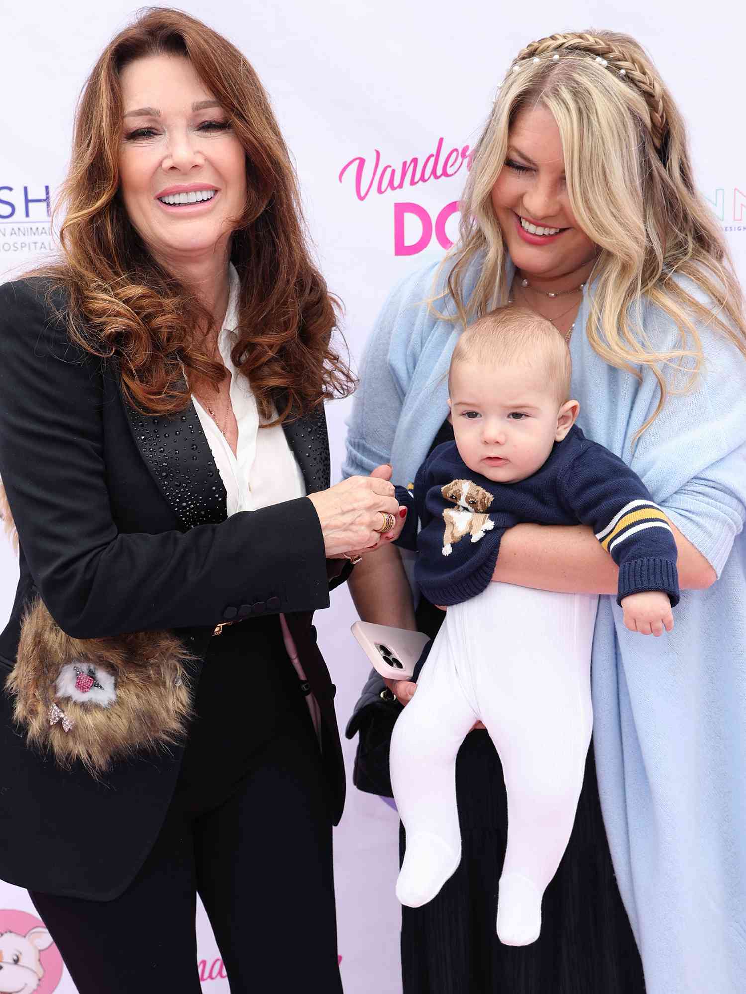 Lisa Vanderpump, daughter Pandora Vanderpump Sabo and her son Theodore attend the Vanderpump Dog Foundation's 6th Annual World Dog Day event on May 28, 2022 in West Hollywood, California.