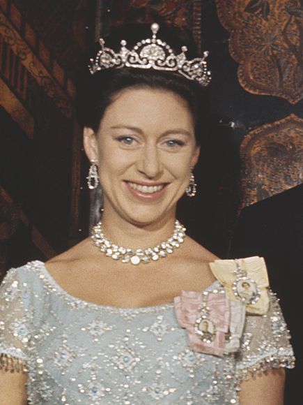 Princess Margaret, Countess of Snowdon (1930-2002) pictured wearing a tiara and ornate necklace with her husband Antony Armstrong-Jones, 1st Earl of Snowdon at an official royal engagement in 1966.. (Photo by Images)