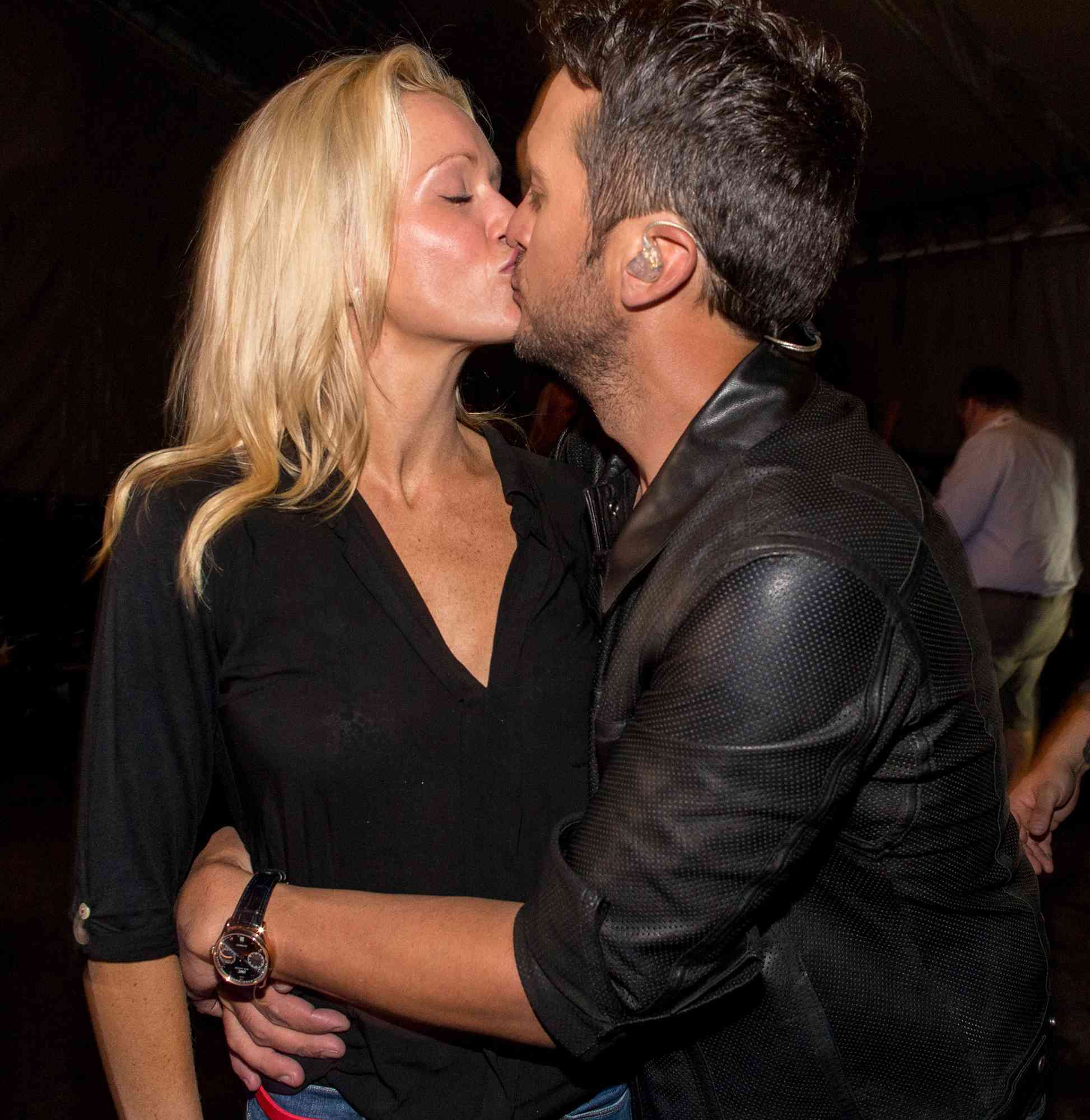 Caroline Boyer (L) and singer Luke Bryan backstage at the ACM Presents: Superstar Duets at Globe Life Park in Arlington on April 17, 2015 in Arlington, Texas