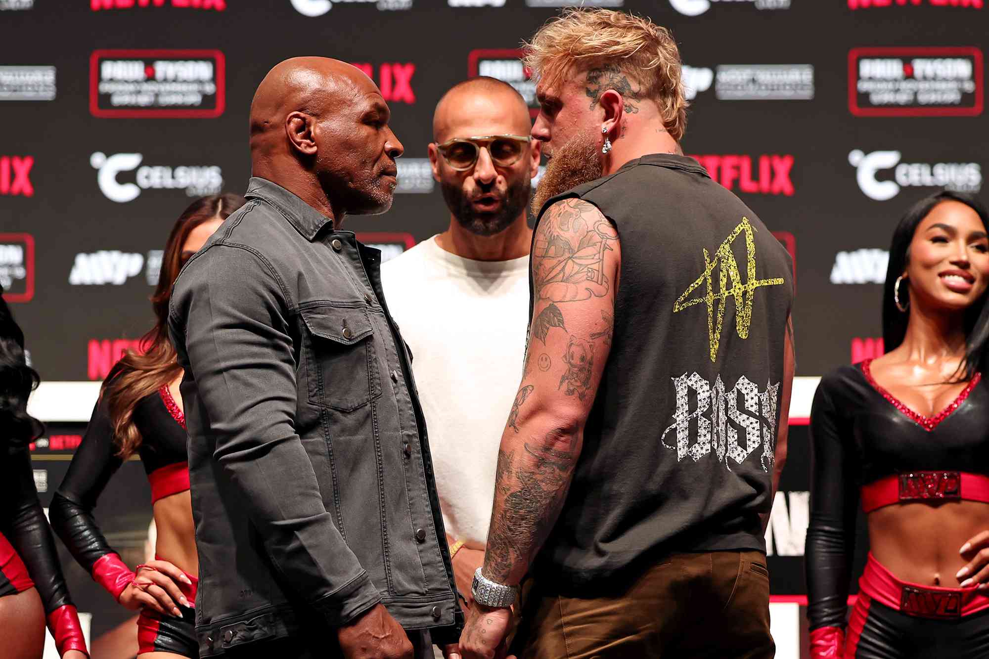 Mike Tyson, Nakisa Bidarian, and Jake Paul attend the press conference for LIVE on Netflix: Jake Paul vs. Mike Tyson at the Toyota Music Factory on November 13, 2024 in Dallas, 