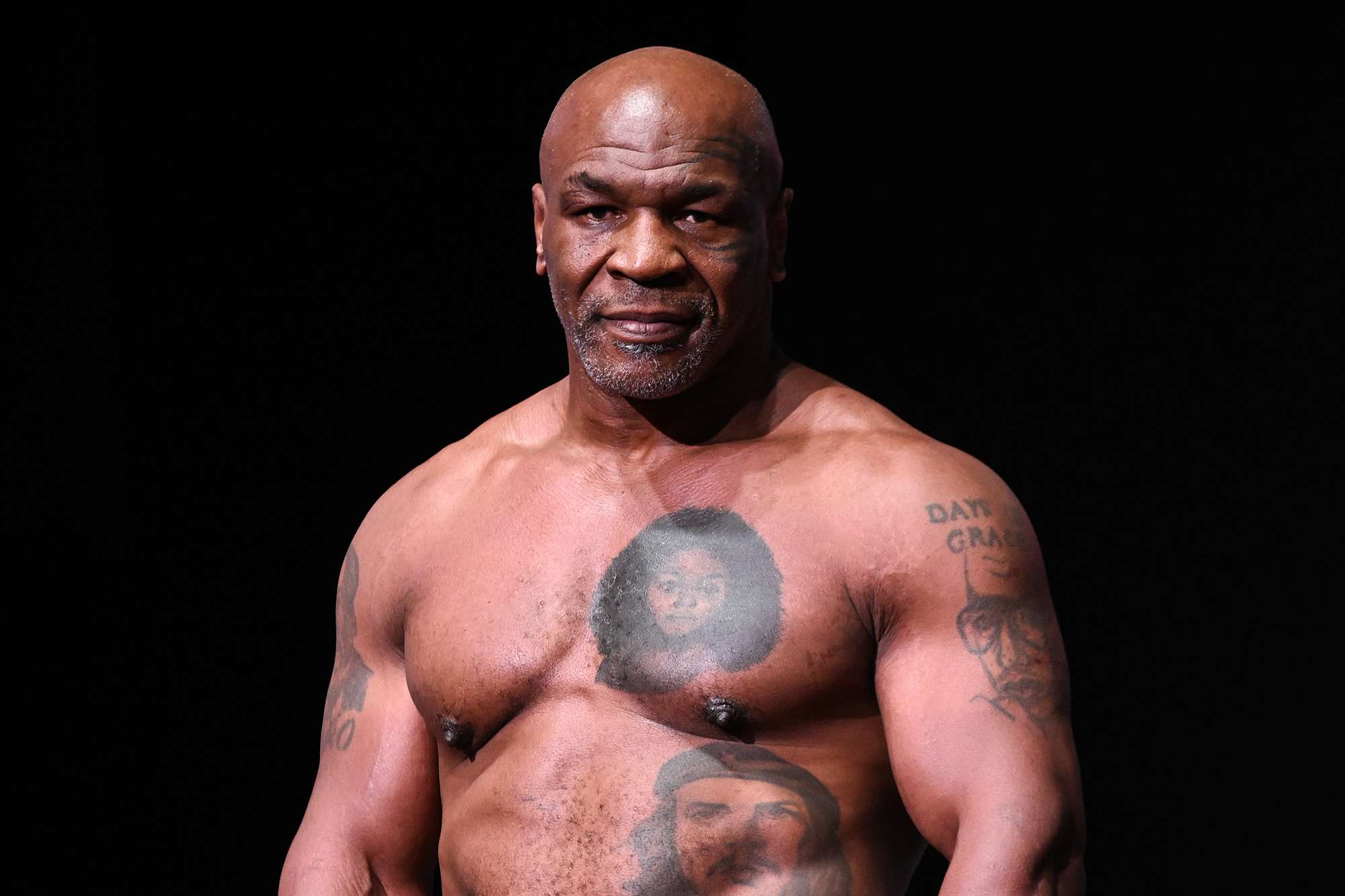 Mike Tyson gets on scale during Weigh-In at the Toyota Music Factory in Irving, Texas on November 14, 2024 ahead of his match with Jake Paul for heavyweight world titles of the Premiere Boxing Championship which will be on November 15 Friday night at AT&amp;T Stadium in Arlington, Texas, United States