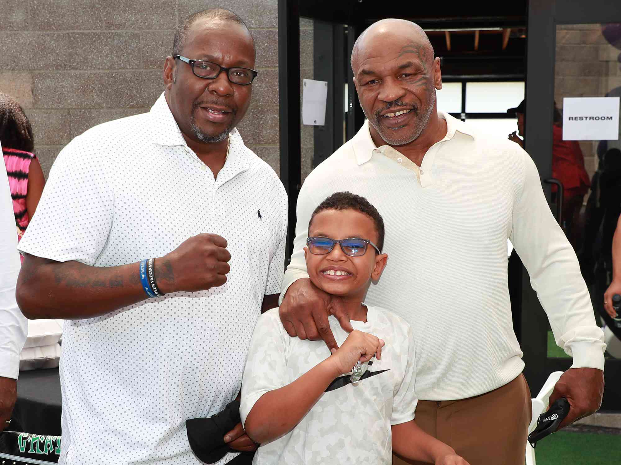 Bobby Brown, Mike Tyson and his son Morocco attend the 100 Women Matter Luncheon hosted by We2Matter and Dream Corps JUSTICE at Tyson Ranch on May 08, 2021 in El Segundo, California