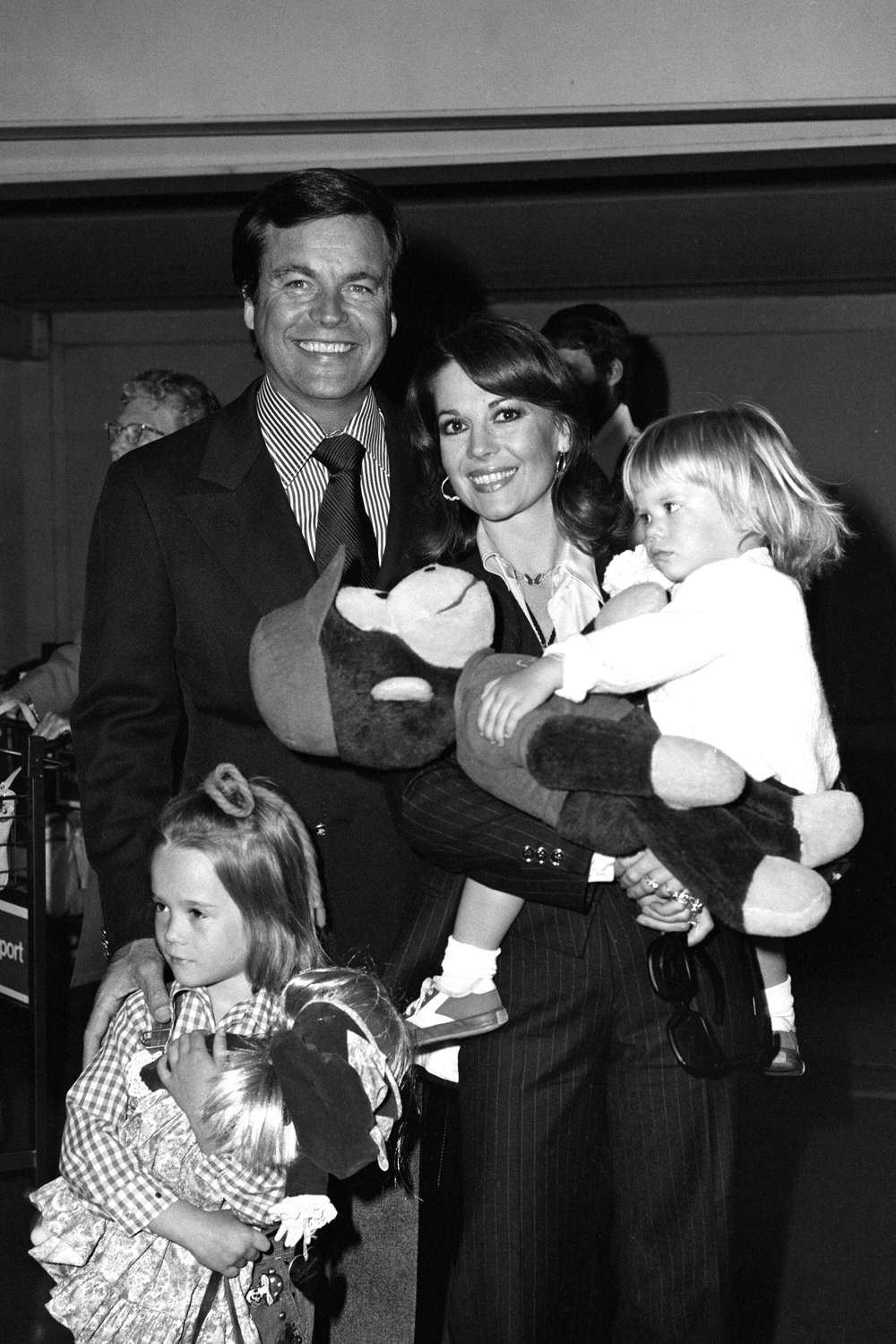 Robert Wagner and his wife Natalie Wood arrive at Heathrow Airport from Los Angeles with their children Courtney and Natasha. 