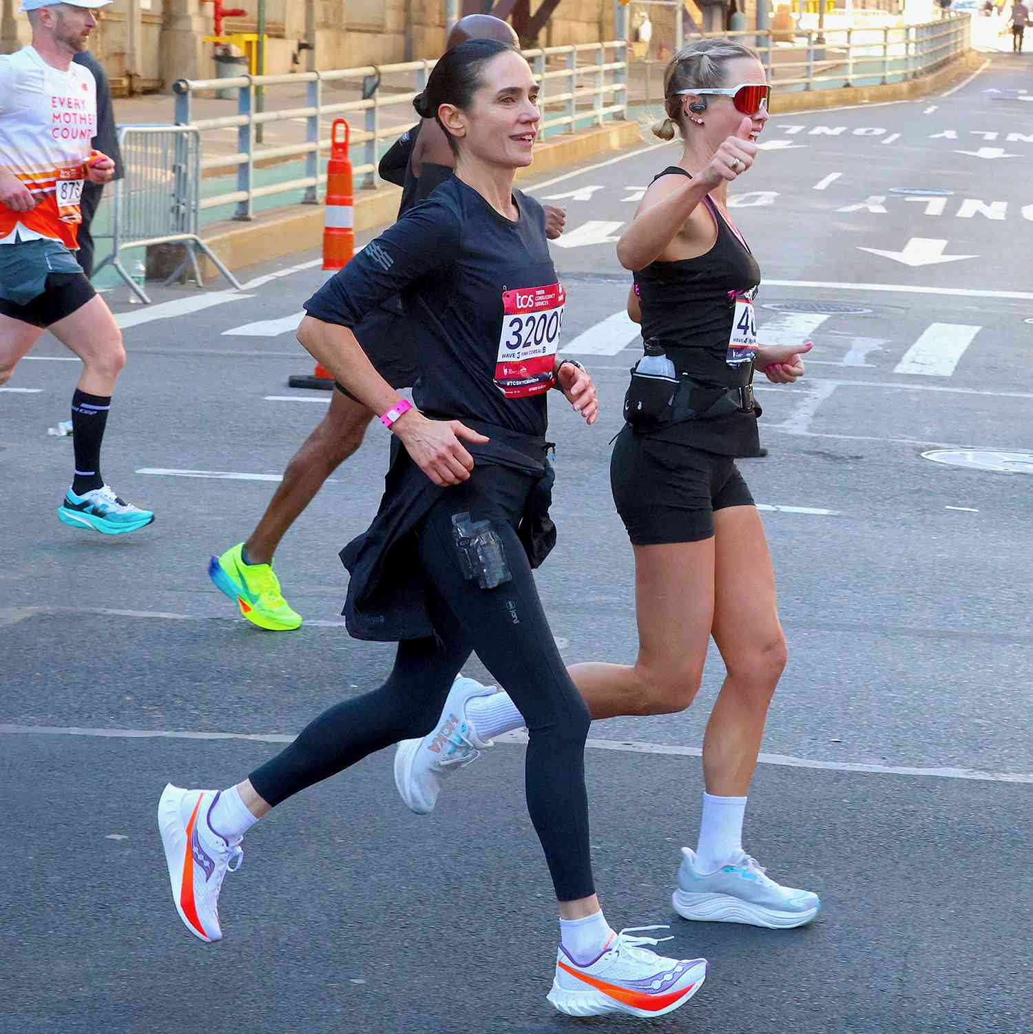 Jennifer Connelly and Model Claire Holt are running the 2024 New York Marathon in the Upper East Side, Manhattan on November 3, 2024