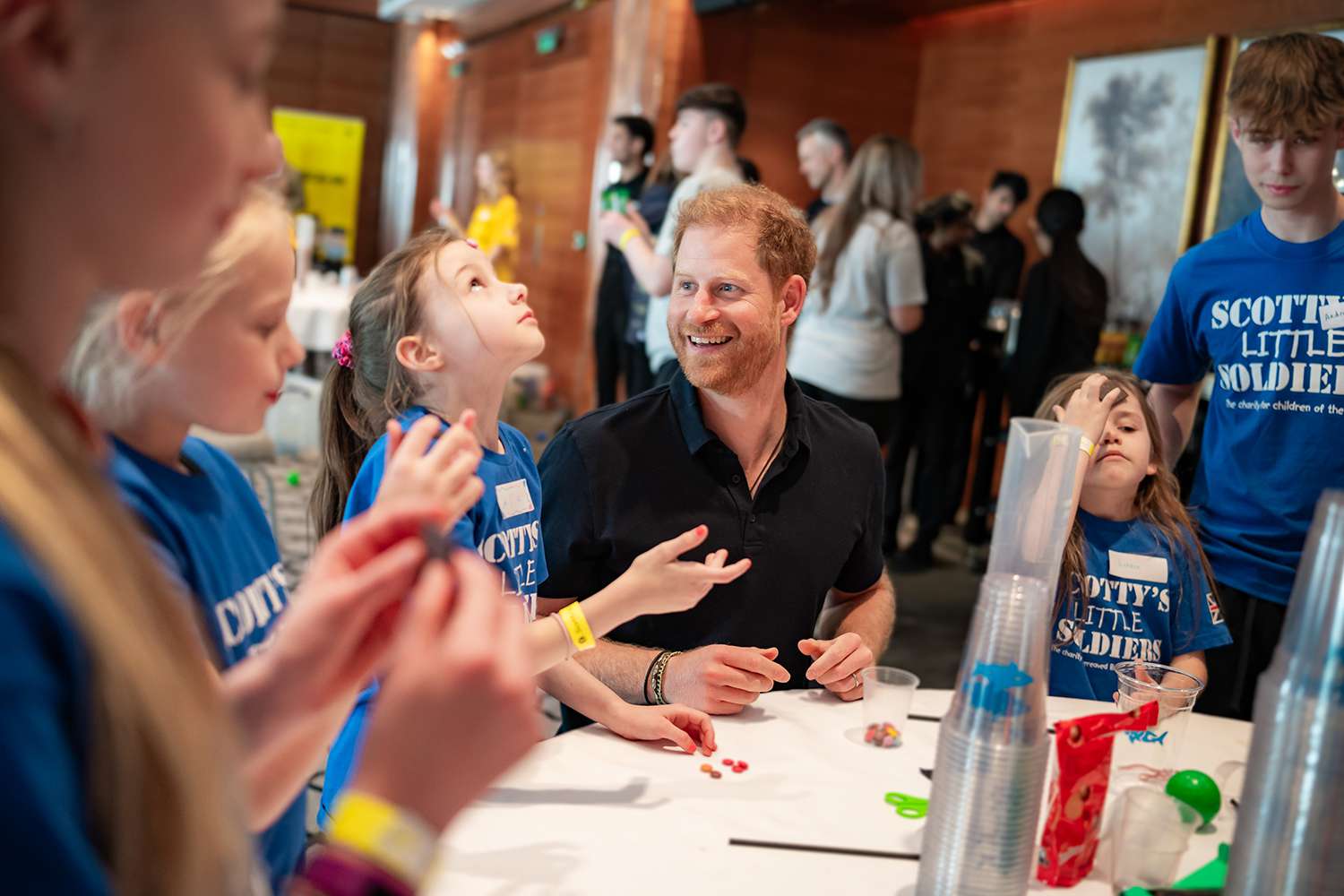 Prince Harry with members of Scotty's Little Soldiers in May 2024