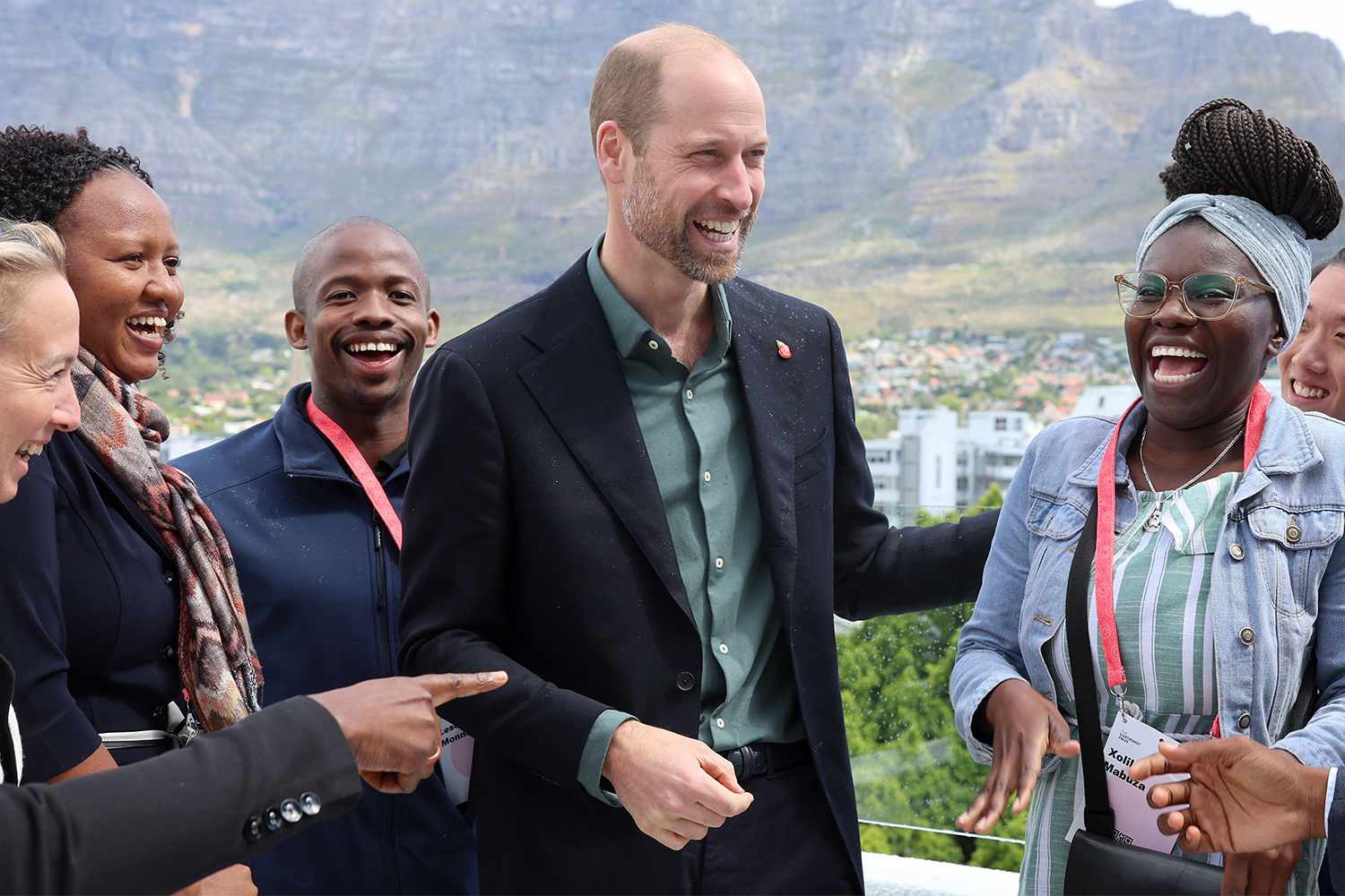 Prince William, Prince of Wales talks to young people at the Earthshot Prize Climate Leaders Youth Programme with the iconic Table Mountain in the background on November 04, 2024 in Cape Town, South Africa