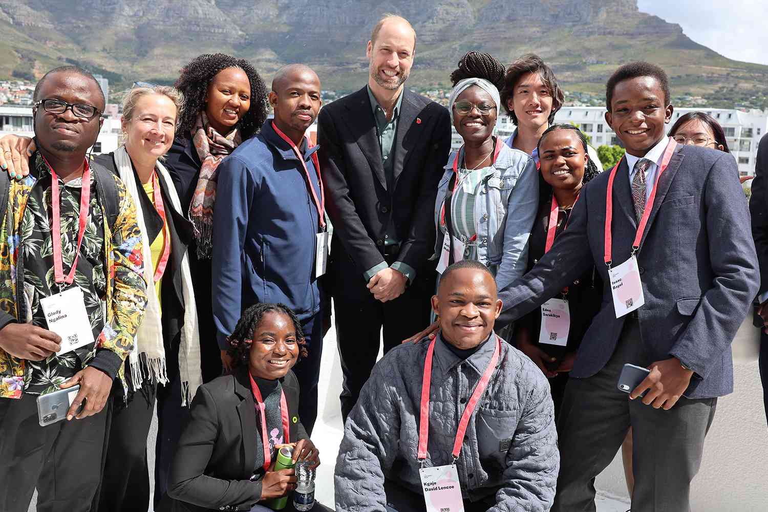 Prince William, Prince of Wales poses with young climate activists in front of the iconic Table Mountain at the Earthshot Prize Climate Leaders Youth Programme on November 04, 2024 in Cape Town, South Africa