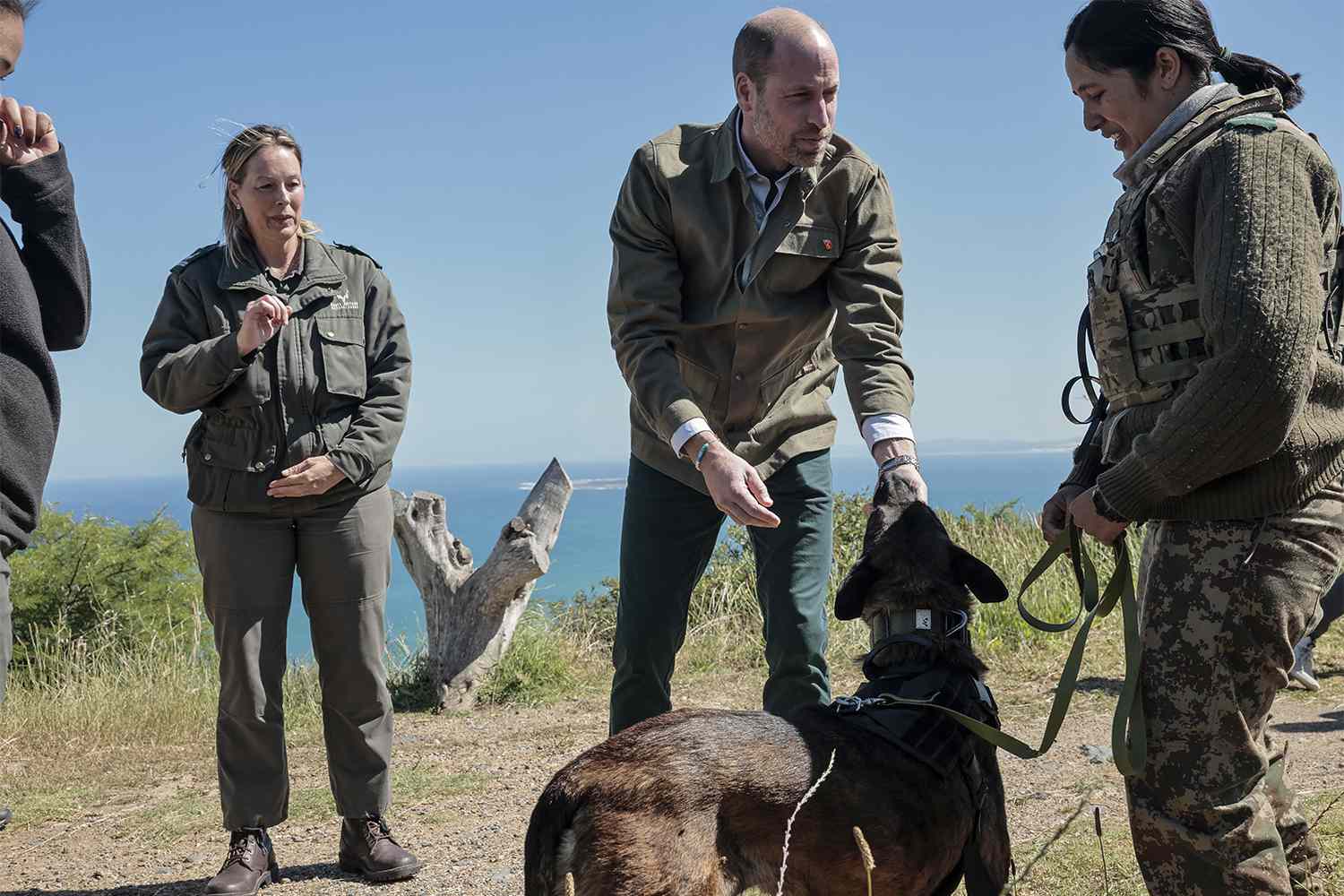 Prince William (2nd R), Prince of Wales, meets with Park Manager for Table Mountain National Park Megan Taplin (L) and other rangers while visiting Signal Hill in Cape Town on November 5, 2024