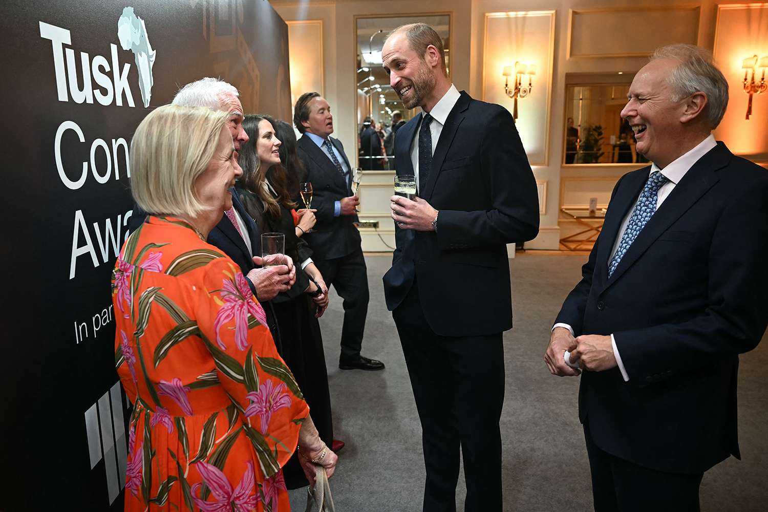 Britain's Prince William, Prince of Wales (2R) talks with sponsors as he attends the ceremony for 12th annual Tusk Conservation Awards, at The Savoy Hotel in London on November 27, 2024.