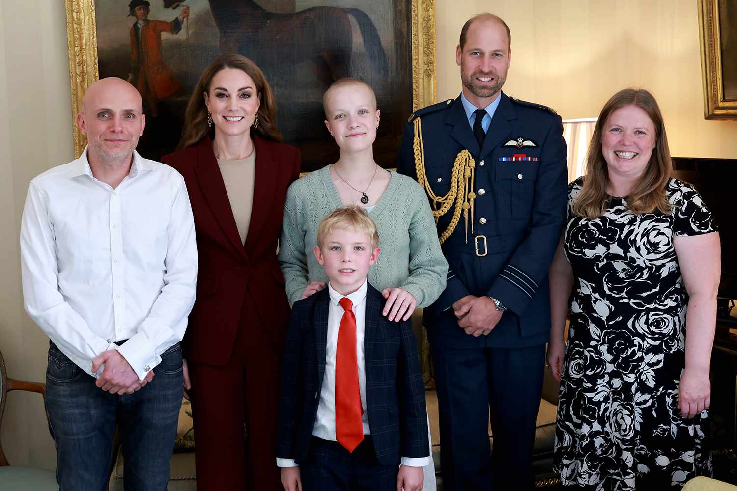 The Prince and Princess of Wales meeting young photographer Liz Hatton and family at Windsor Castle.