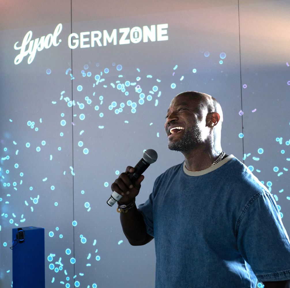 Taye Diggs joins Lysol at The Germ Zone activation booth at The University of Alabama to educate football fans on air sanitization during game day.