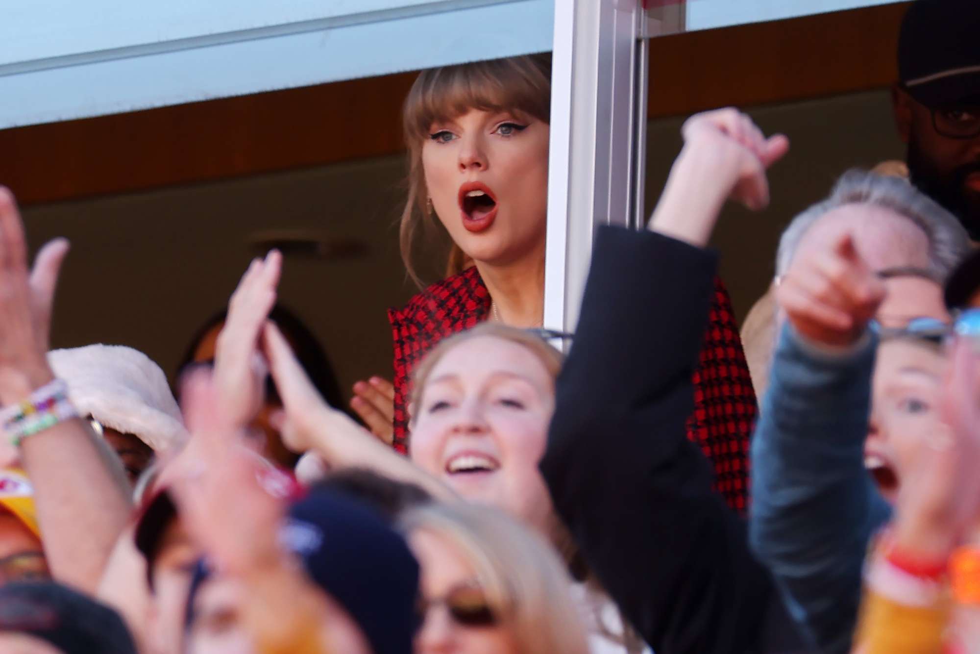 Taylor Swift watches the first half of game between the Kansas City Chiefs and the Denver Broncos at GEHA Field at Arrowhead Stadium on November 10, 2024 in Kansas City, Missouri. 