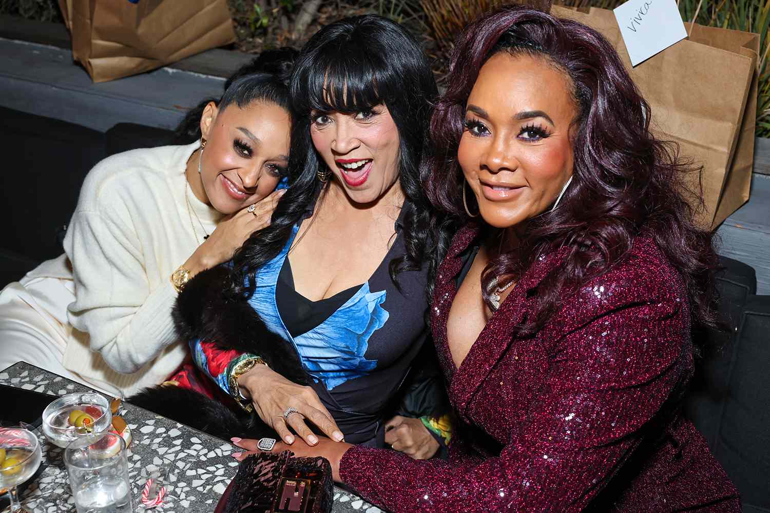 Tia Mowry, Jackee Harry and Vivica A. Fox attend the It's A Wonderful Lifetime 2024 Holiday Event