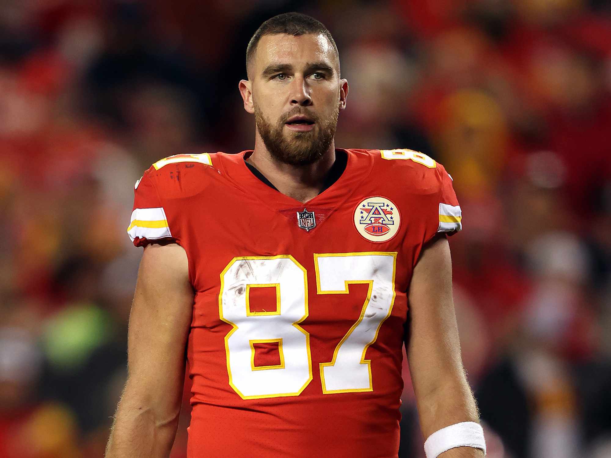 Travis Kelce #87 of the Kansas City Chiefs walks off the field during a timeout in the game against the Denver Broncos at Arrowhead Stadium on December 05, 2021 in Kansas City, Missouri