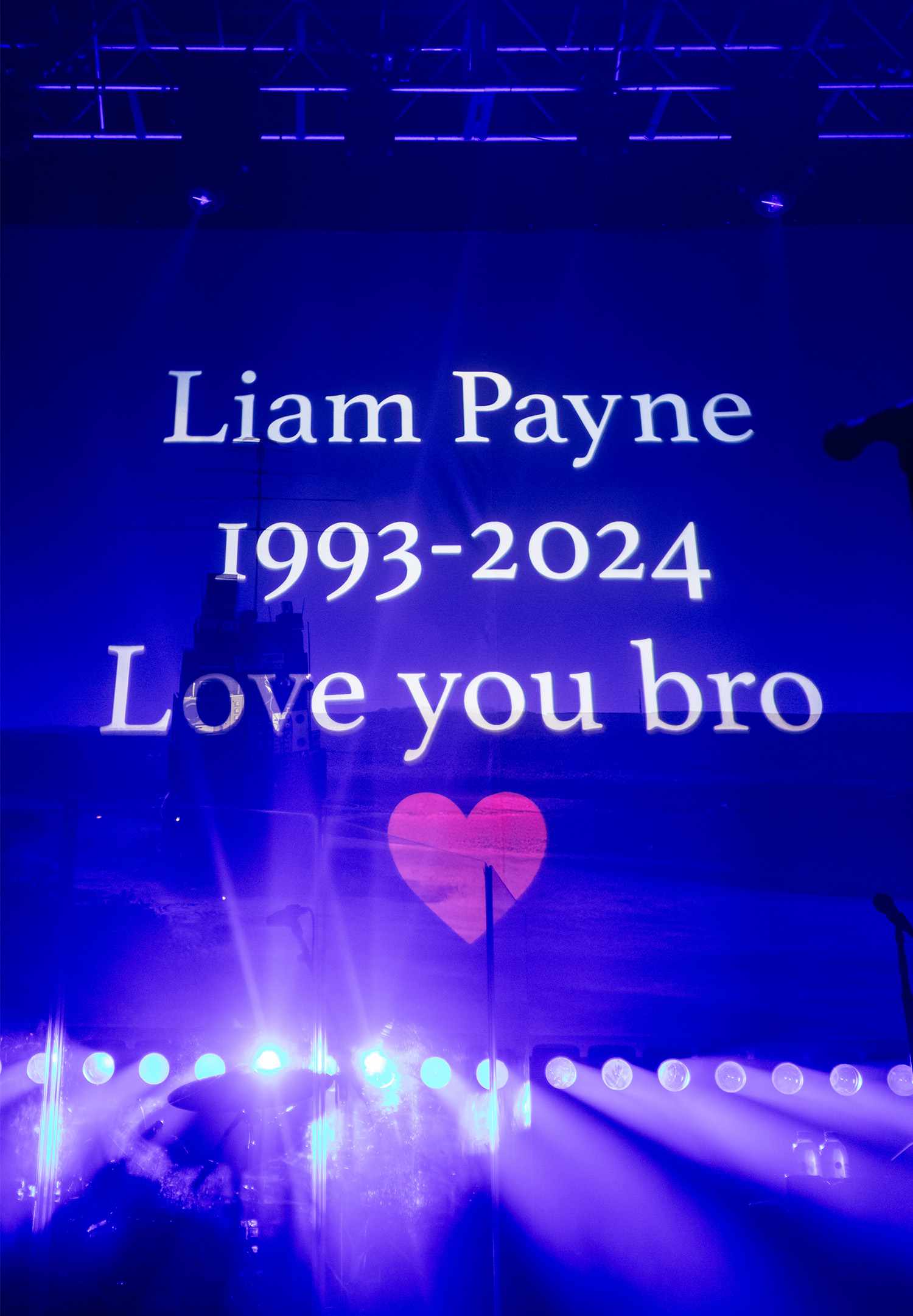 A written tribute to Liam Payne appears onscreen during Zayn's performance at O2 Academy Leeds on November 23, 2024 in Leeds