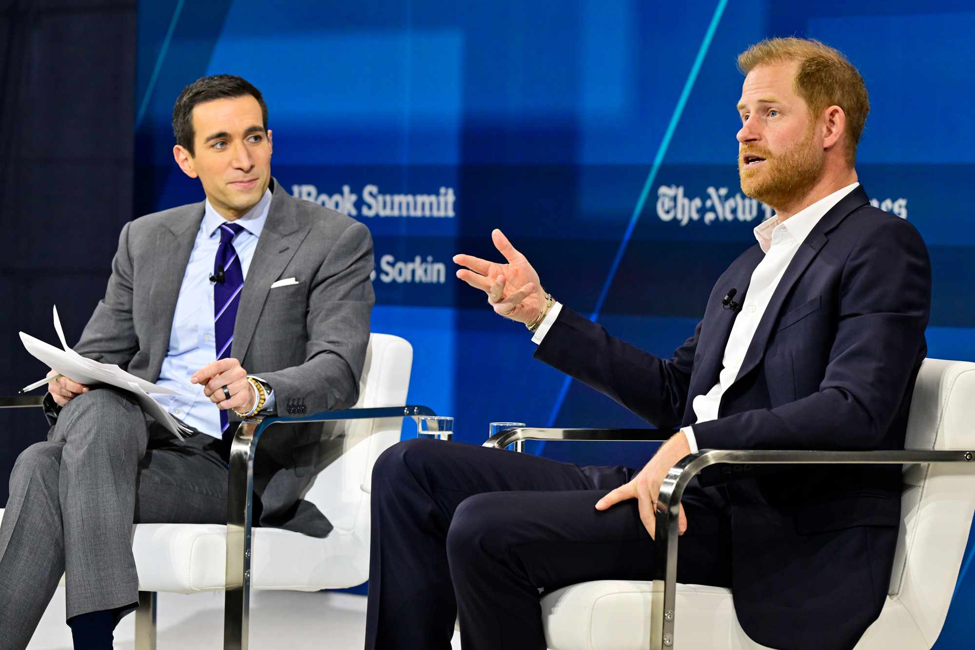 Andrew Ross Sorkin and Prince Harry, Duke of Sussex, speak onstage during The New York Times Dealbook Summit