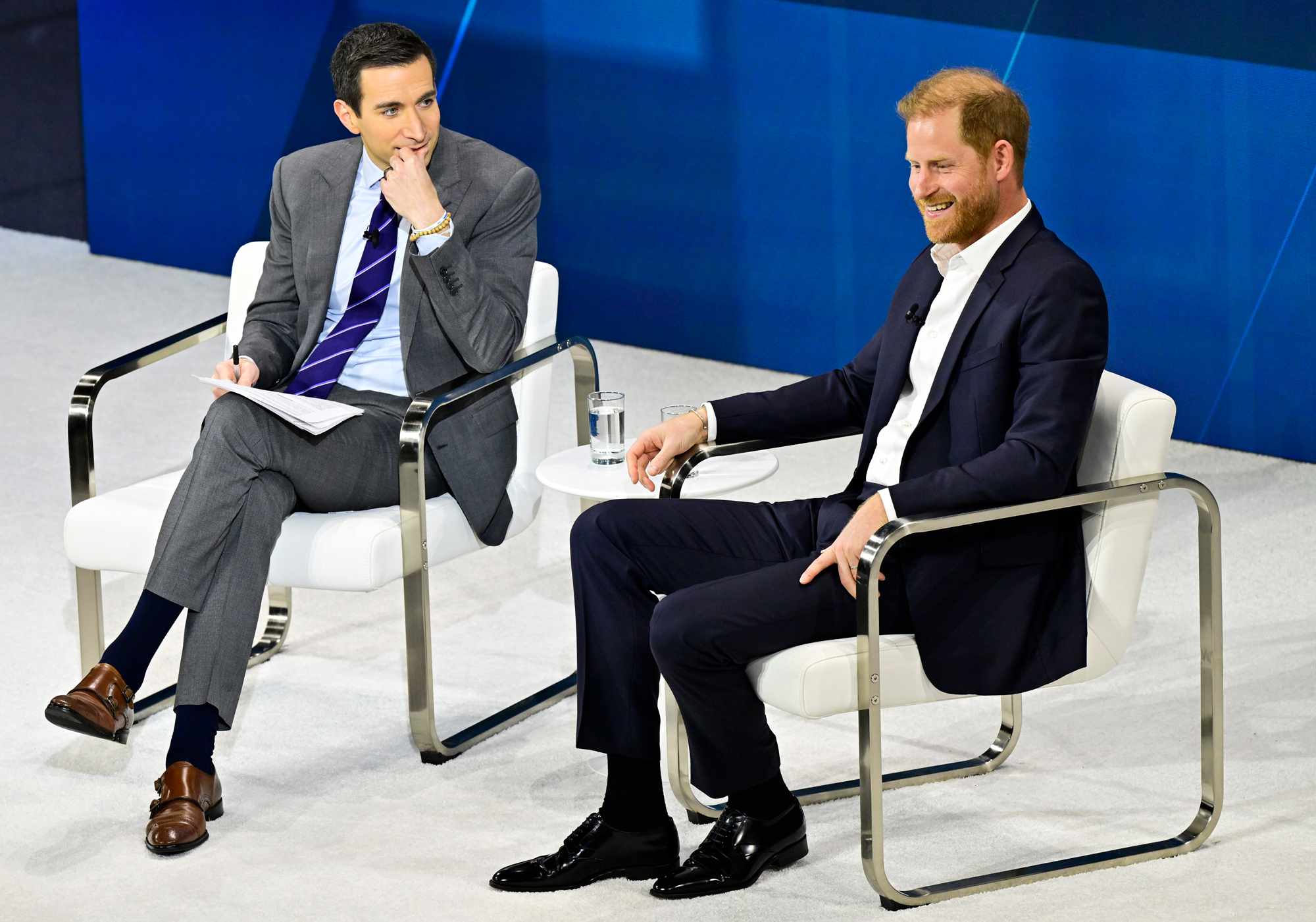 Andrew Ross Sorkin and Prince Harry, Duke of Sussex, speak onstage during The New York Times Dealbook Summit