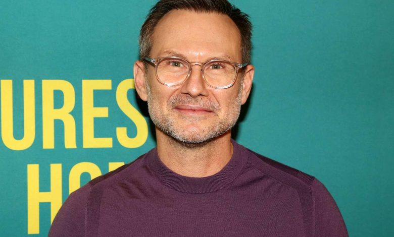 Christian Slater poses at the opening night of the play