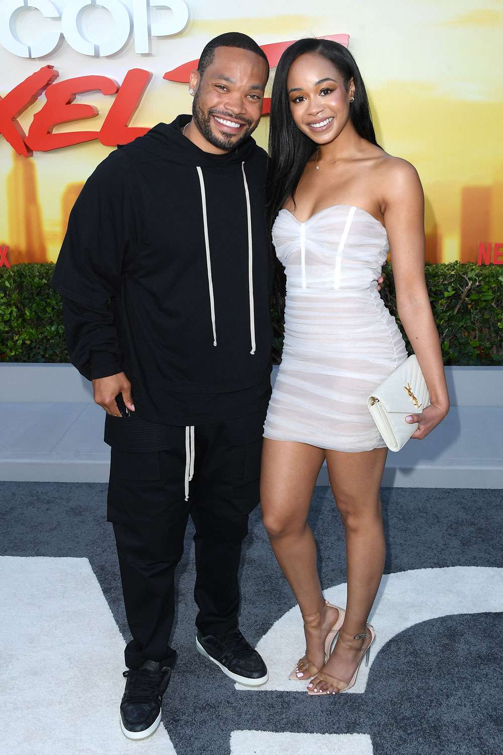  Eric Murphy and Jasmine Page arrives at the Los Angeles Premiere Of Netflix's "Beverly Hills Cop: Axel F" at Wallis Annenberg Center for the Performing Arts on June 20, 2024 in Beverly Hills, California. 