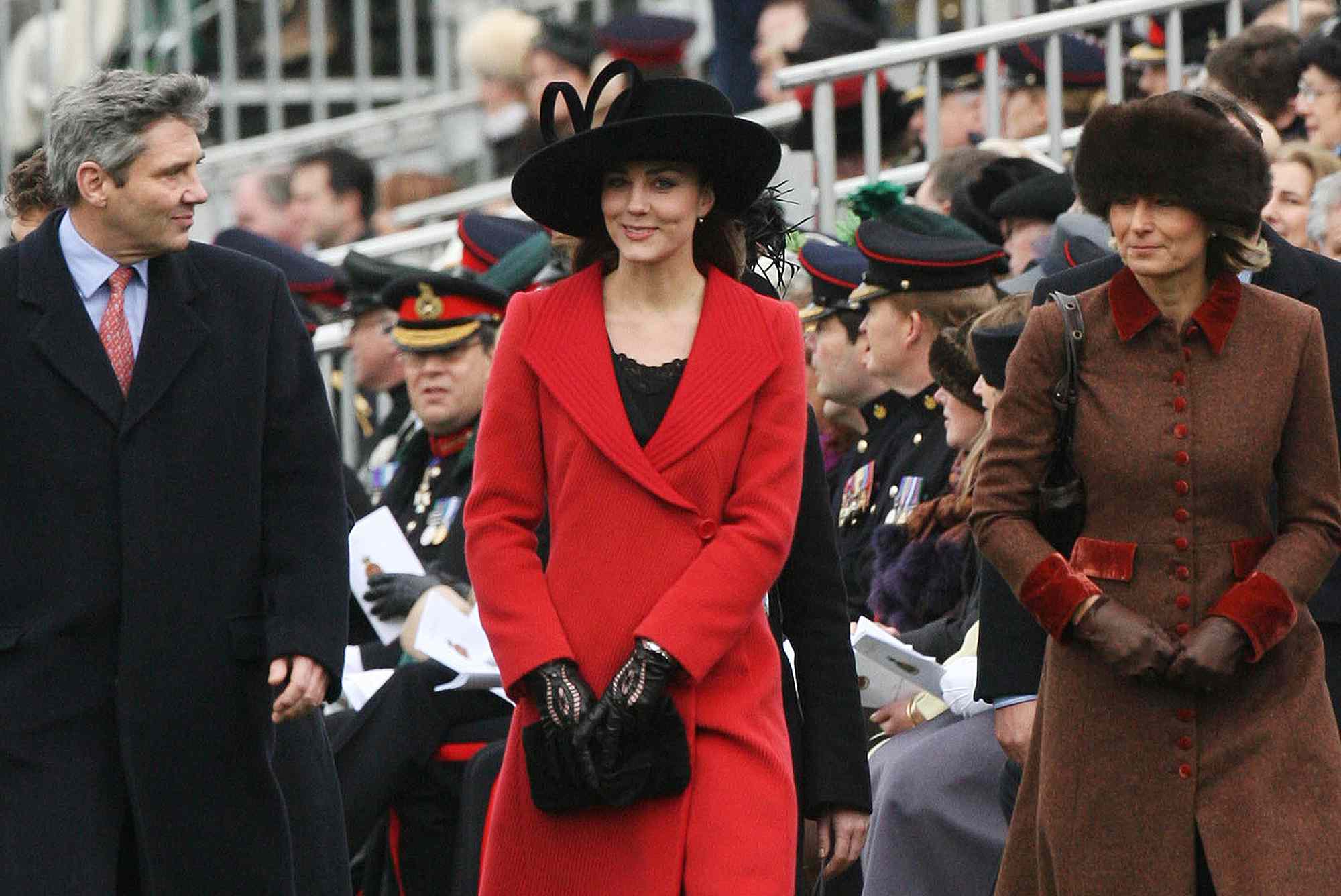 Kate Middleton, Prince William's girlfriend, with her parents Carole and Michael at the Sovereign's Parade at Sandhurst Military Academy to watch the passing-out parade. 