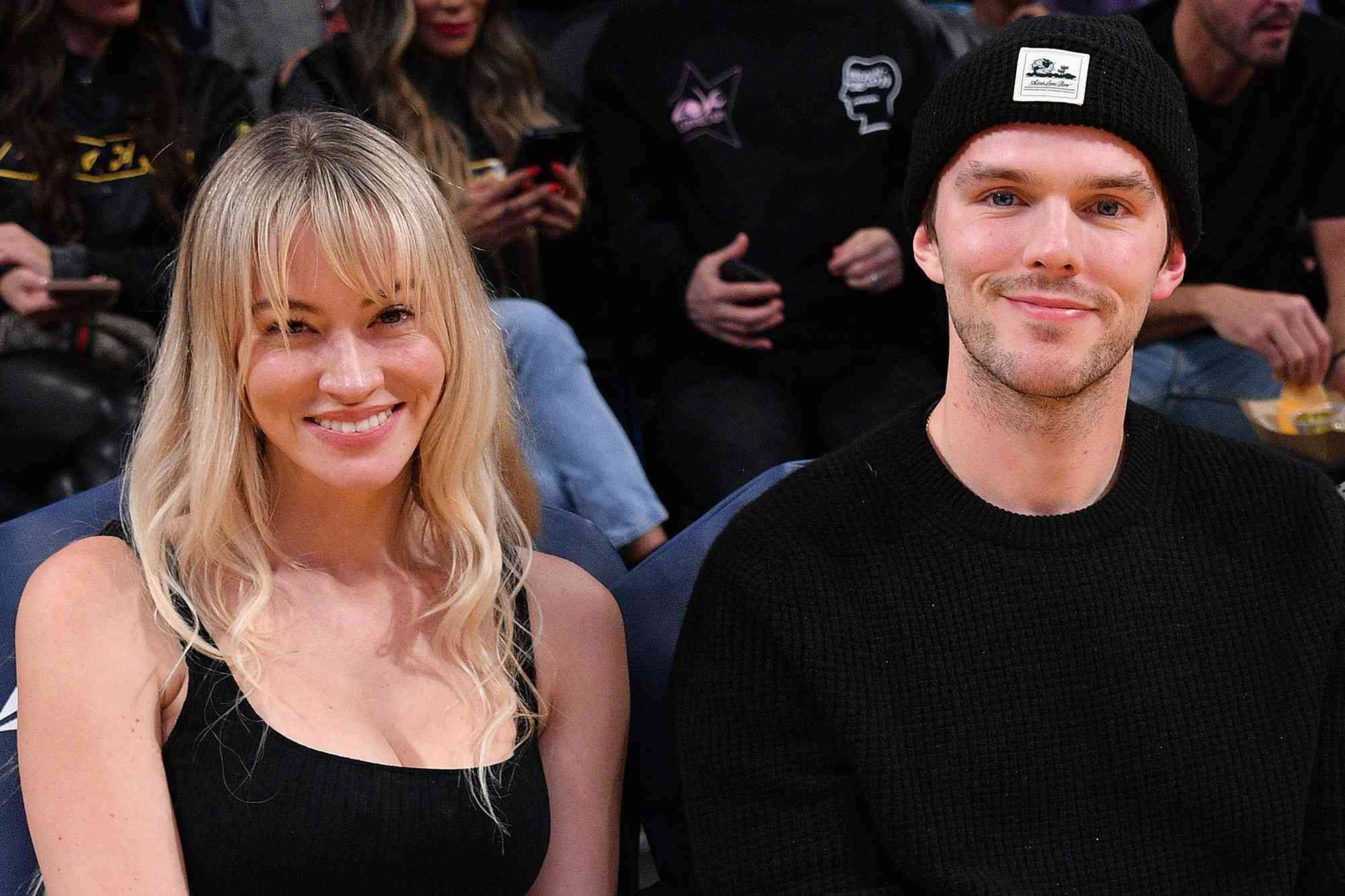 LOS ANGELES, CALIFORNIA - JANUARY 15: Nicholas Hoult and Bryana Holly attend a basketball game between the Los Angeles Lakers and the Philadelphia 76ers at Crypto.com Arena on January 15, 2023 in Los Angeles, California.