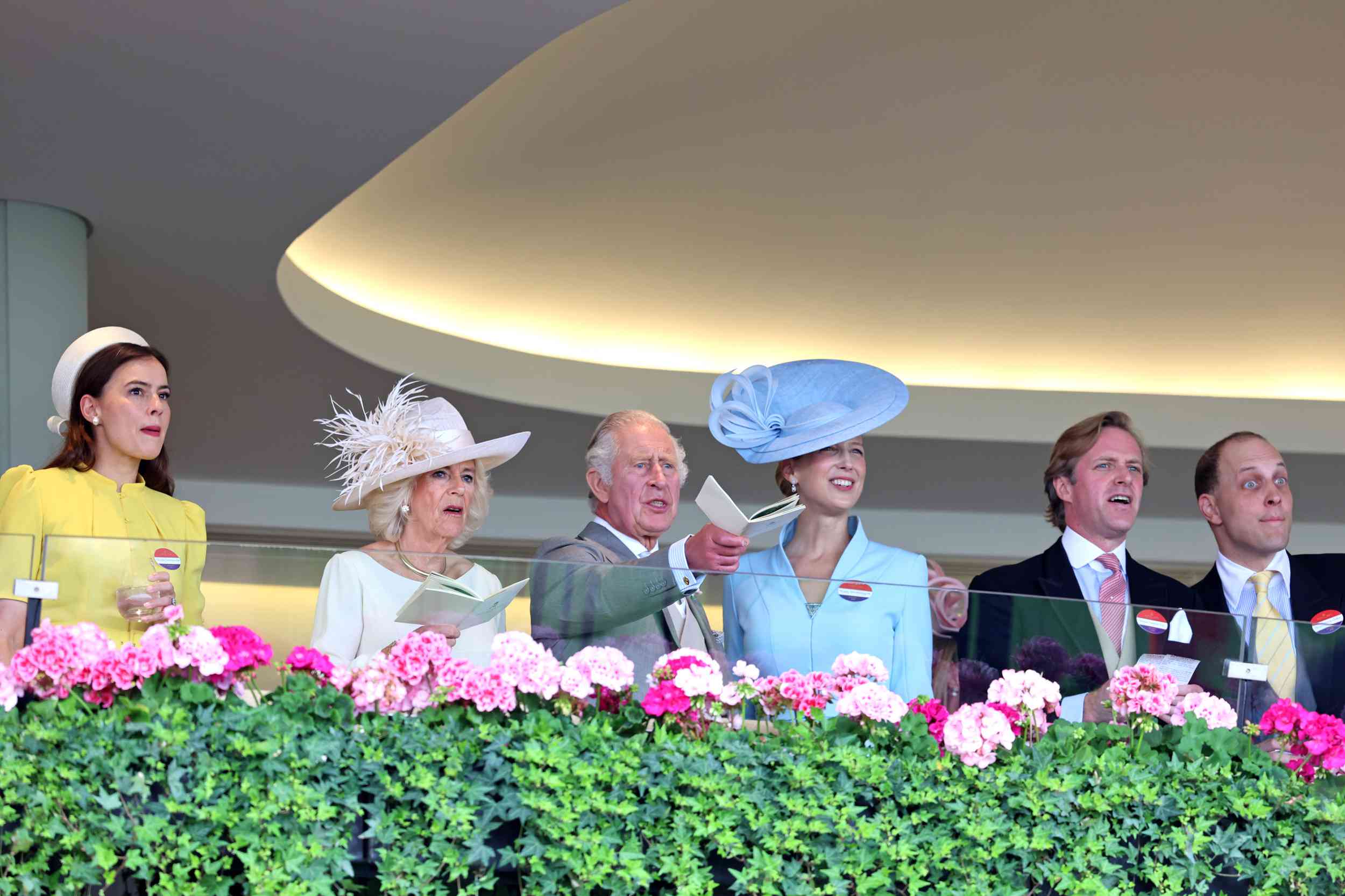 Sophie Winkleman, Queen Camilla, King Charles III, Lady Gabriella Kingston, Thomas Kingston and Lord Frederick Windsor watch a race on day five of Royal Ascot 2023