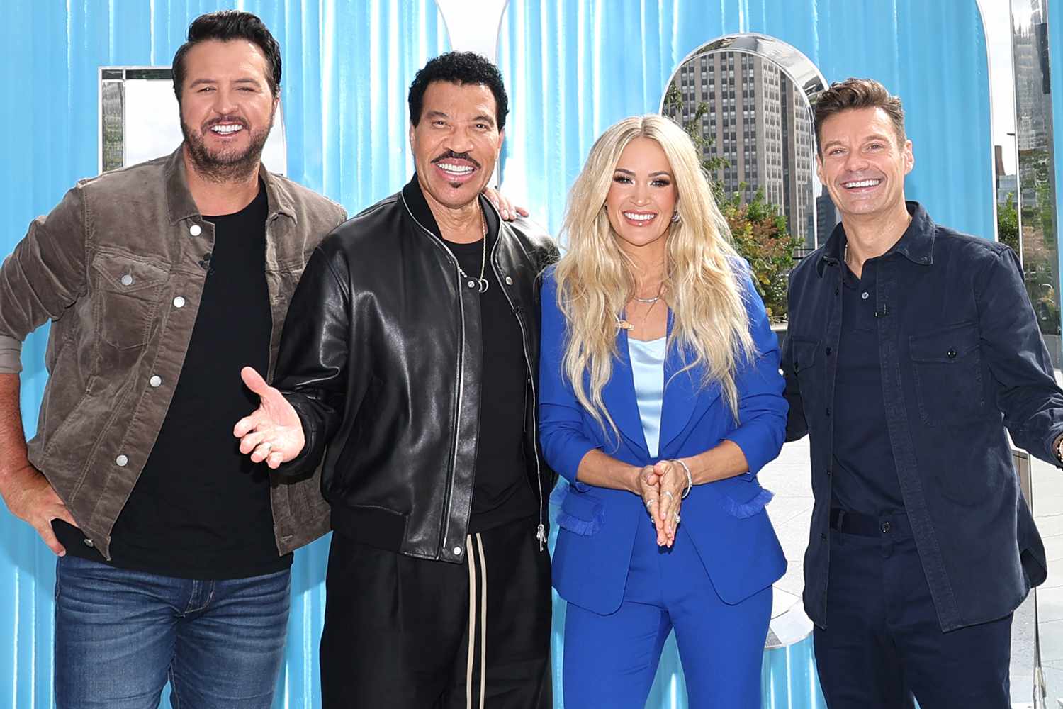 Luke Bryan, Lionel Richie, Carrie Underwood, and Ryan Seacrest pose for a photo during "American idol