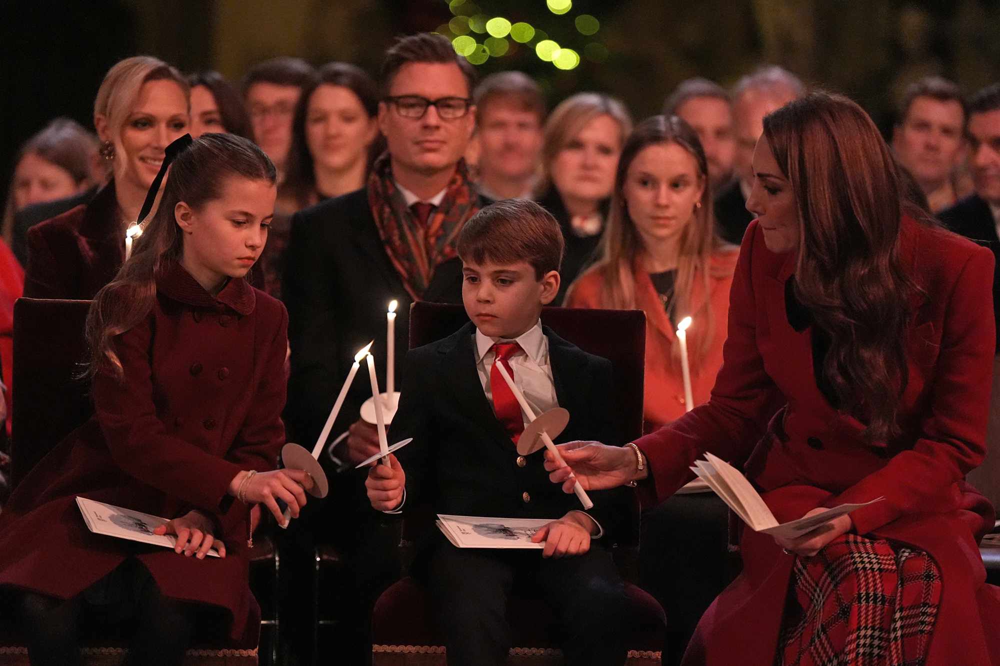 Princess Charlotte, Prince Louis and Catherine, Princess of Wales during the 'Together At Christmas' Carol Service at Westminster Abbey on December 6, 2024 in London, England. The Prince and Princess of Wales, along with other members of the Royal Family, attended the annual carol service.