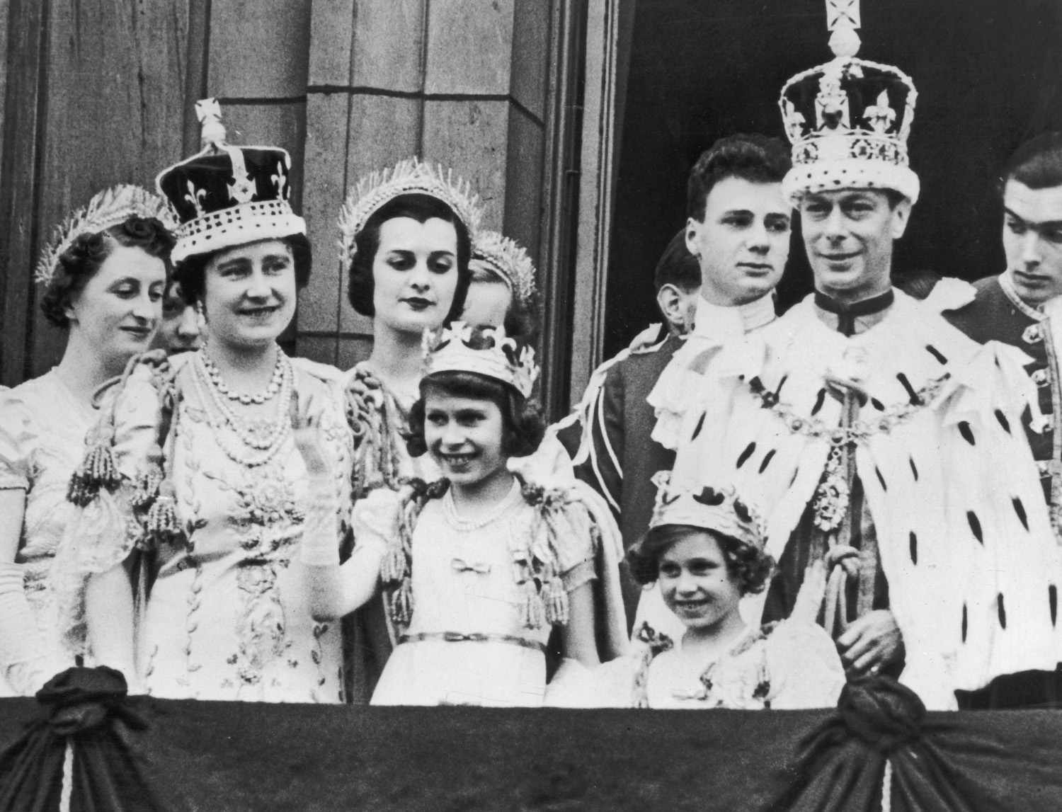 12th September 1937: The royal family on the balcony at Buckingham Palace after the coronation of King George VI (1895 - 1952)