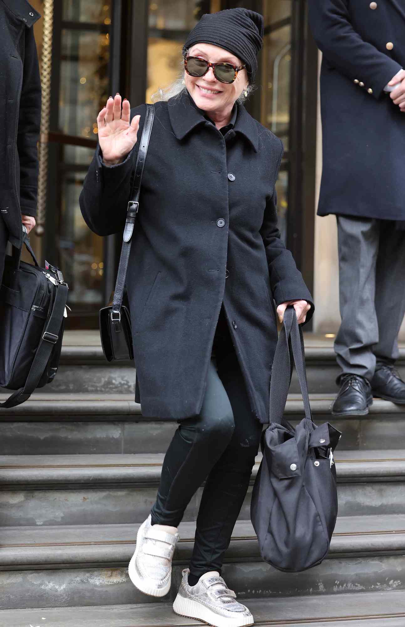 December 5, 2024: Debbie Harry from Blondie leaving The Corinthia Hotel after attending The Fashion Awards. The 79 year old American singer wore a black beanie, trench coat, black trousers, and silver trainers.