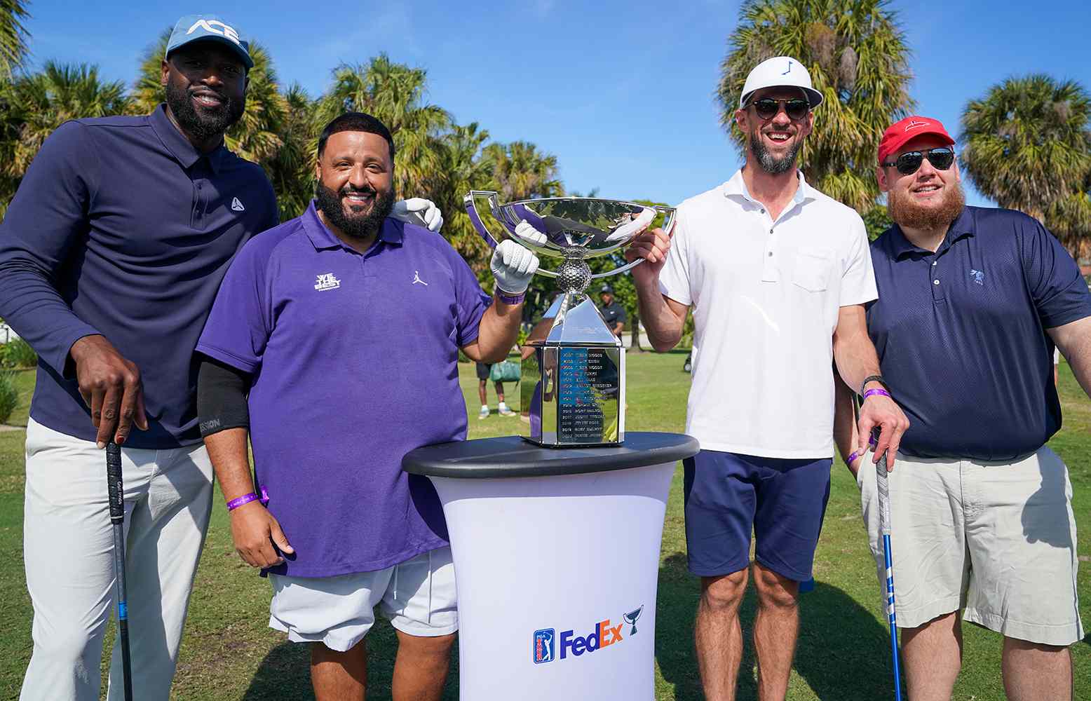 Dwyane Wade, DJ Khaled, Michael Phelps, and Luke Combs participate in the We The Best Foundation x Jordan Golf Classic Celebrity Golf Tournament