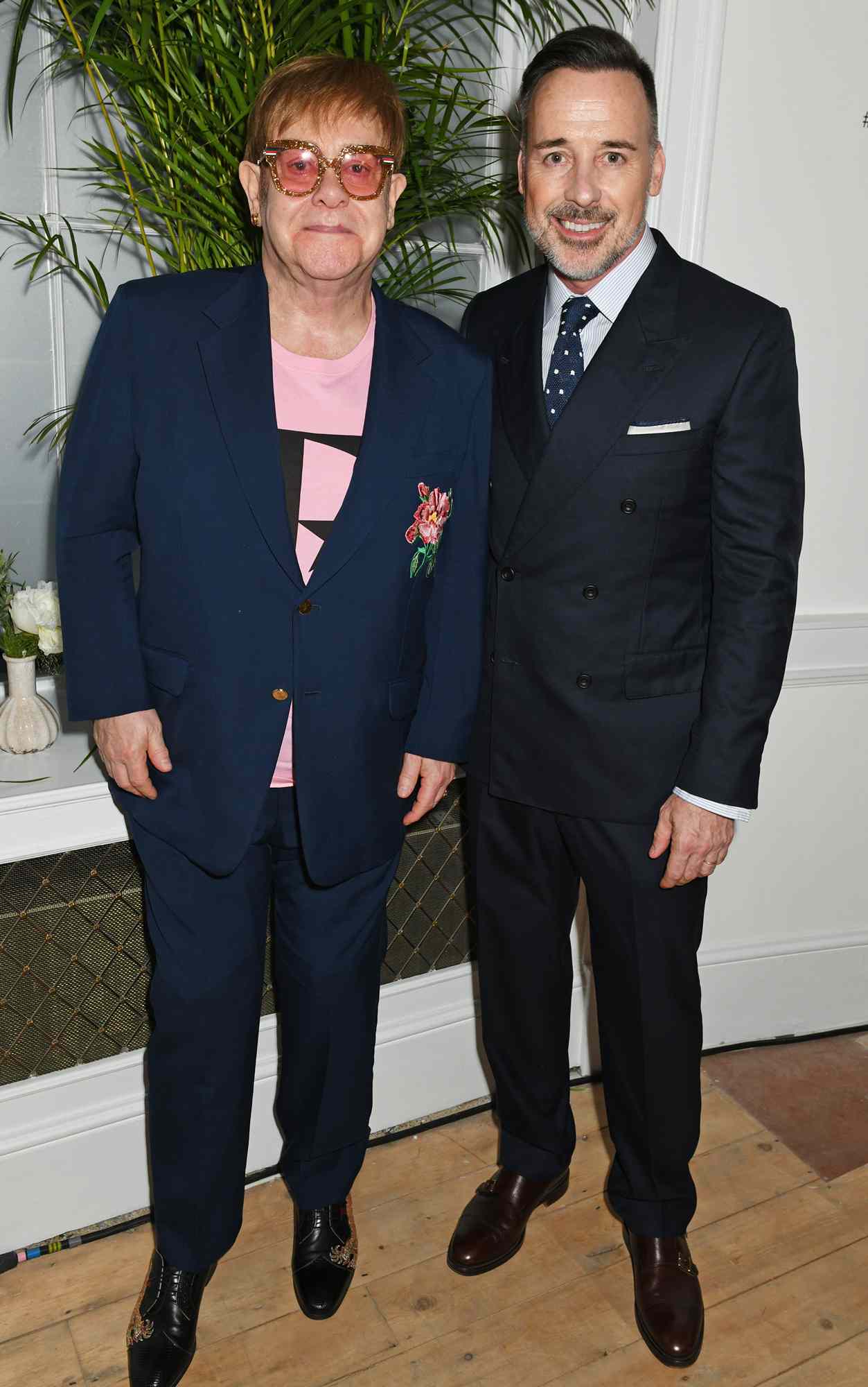 Elton John (L) and David Furnish attend a VIP dinner celebrating the launch of London Fashion Week Men's June 2018 hosted by David Furnish, Dylan Jones and Caroline Rush at the Moet Summer House on June 8, 2018 in London, England