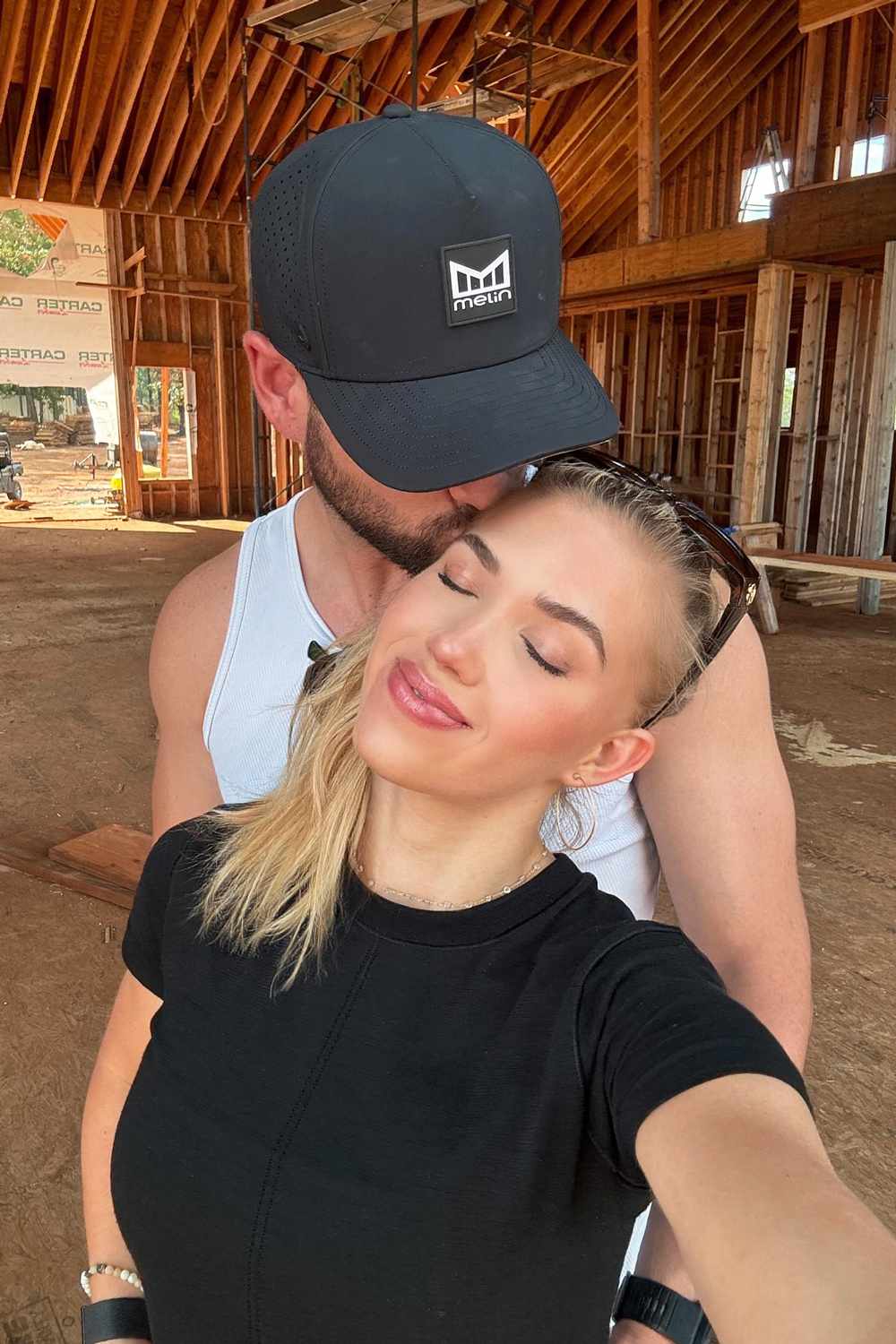 Cody Keith kisses girlfriend Gracie Hunt.