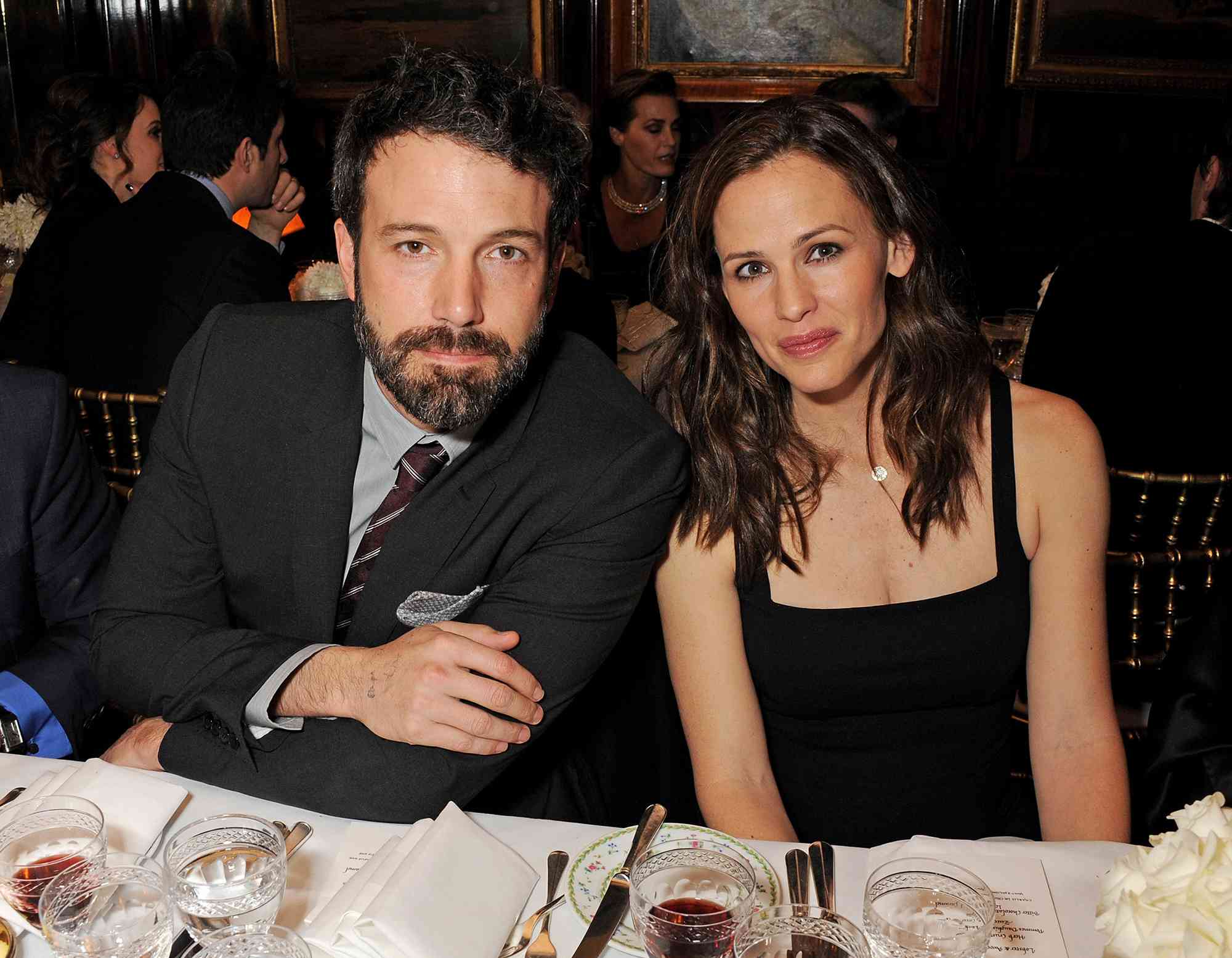 Ben Affleck (L) and Jennifer Garner attend the Charles Finch and Chanel Pre-BAFTA cocktail party and dinner at Annabel's on February 8, 2013 in London, England