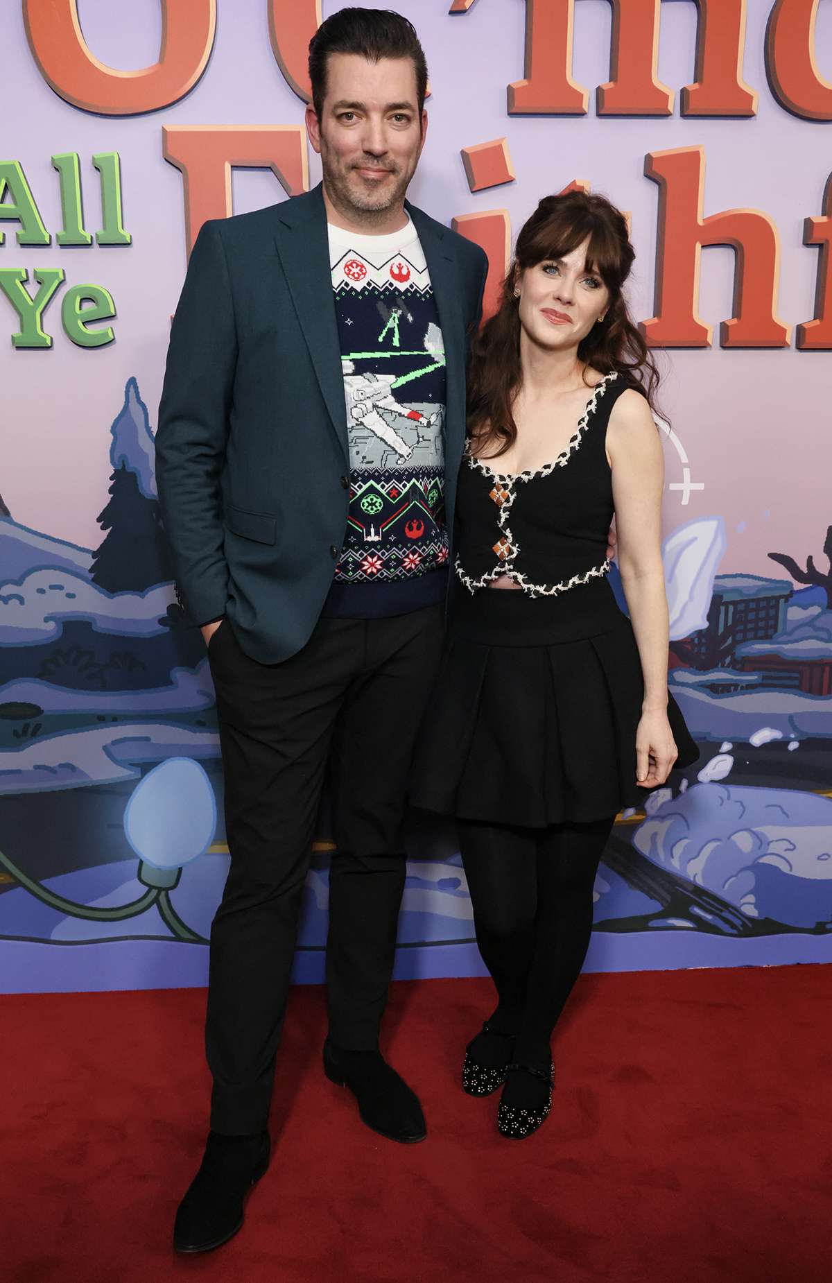 Jonathan Scott and Zooey Deschanel attends "The Simpsons" holiday special world premiere screening