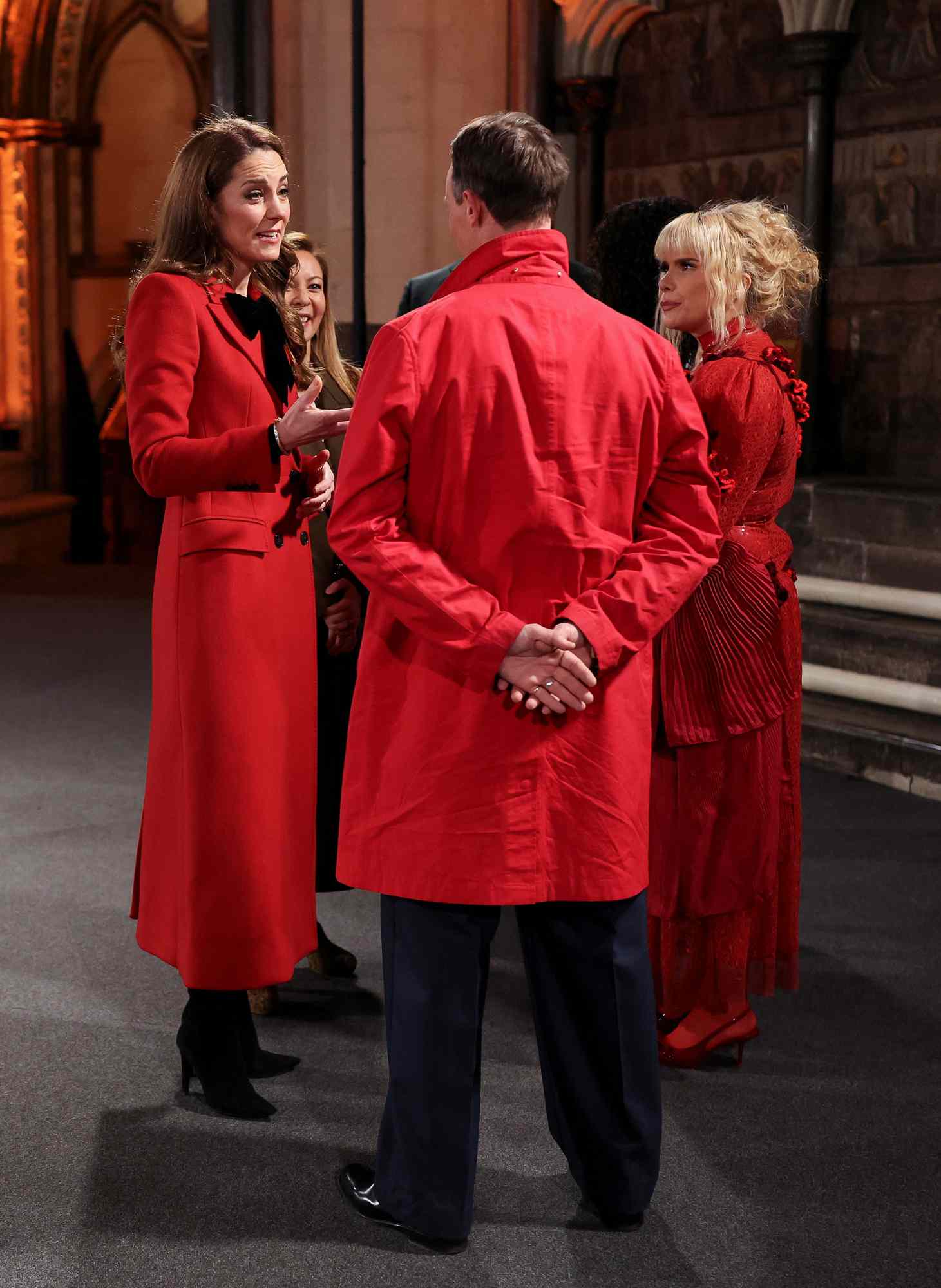 Catherine, Princess of Wales stands next to Paloma Faith during the 'Together At Christmas' Carol Service at Westminster Abbey on December 06, 2024 in London, England.