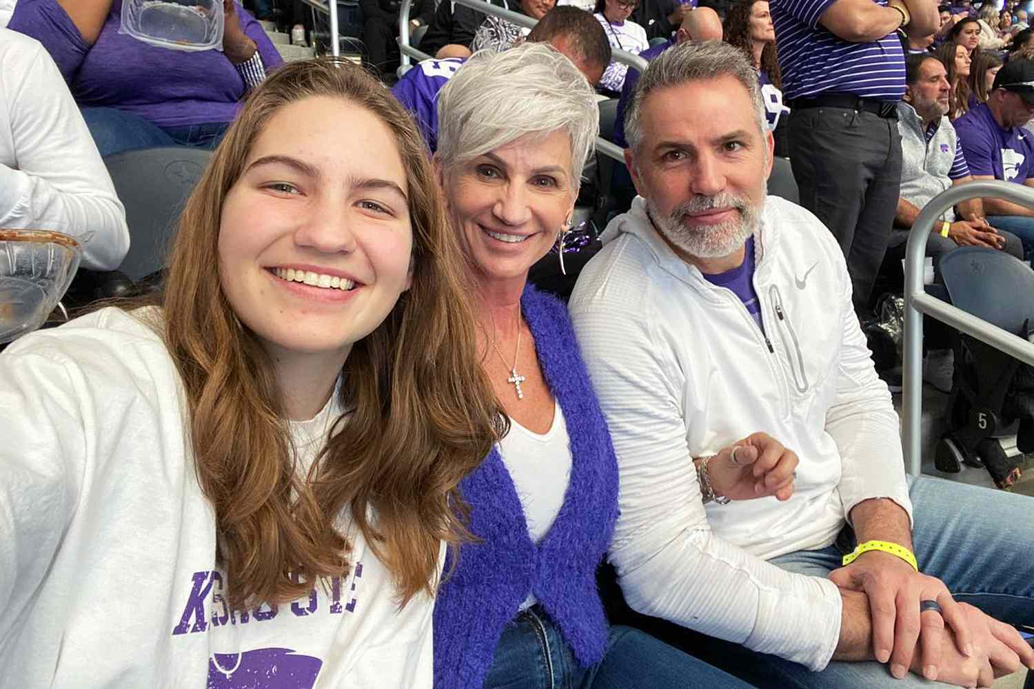 Kurt Warner and wife Brenda with their daughter Sienna Warner attend the 2022 Big12 Championship game at Kansas State University.