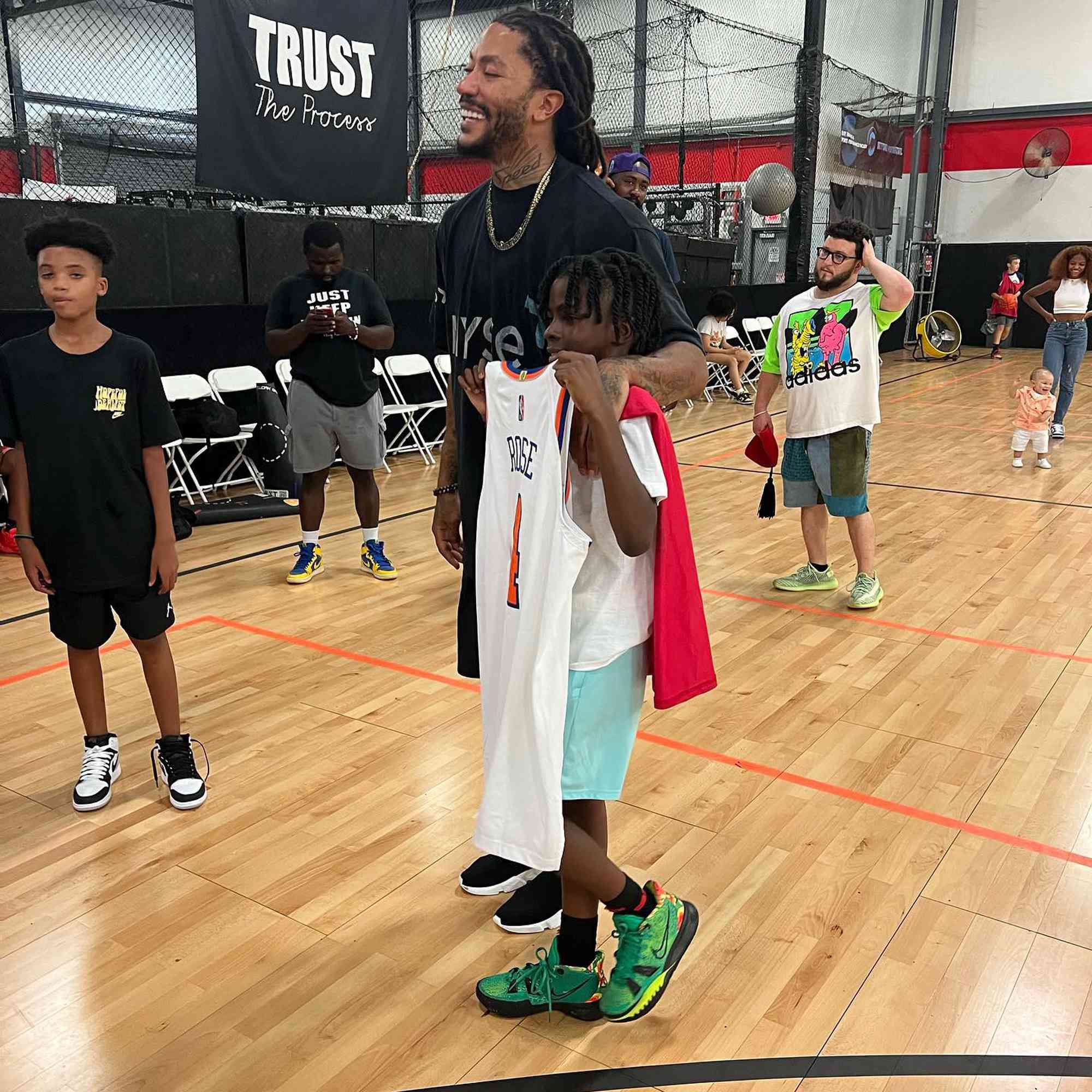 Micah Hill and Derrick Rose.