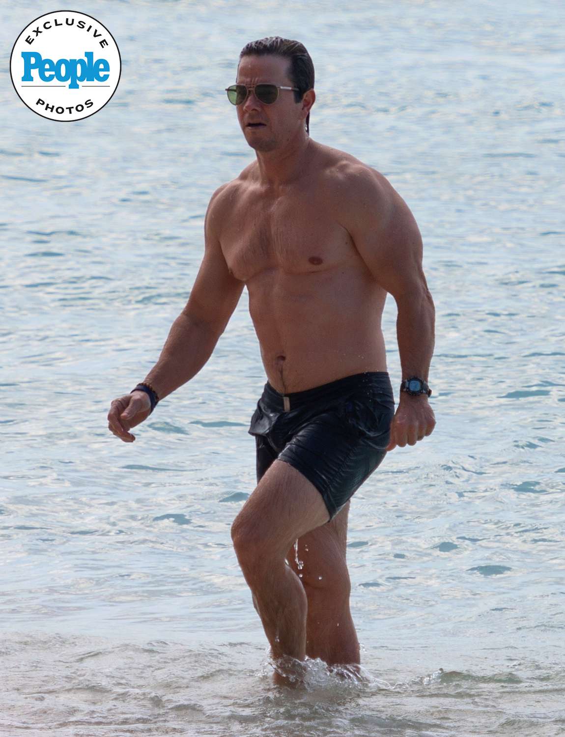 A Shirtless and RIPPED Mark Wahlberg is spotted wearing on-trend short shorts at Sandy Lane Hotel during Barbados getaway 